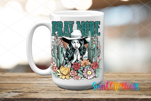a white coffee mug with an image of a woman wearing a cowboy hat