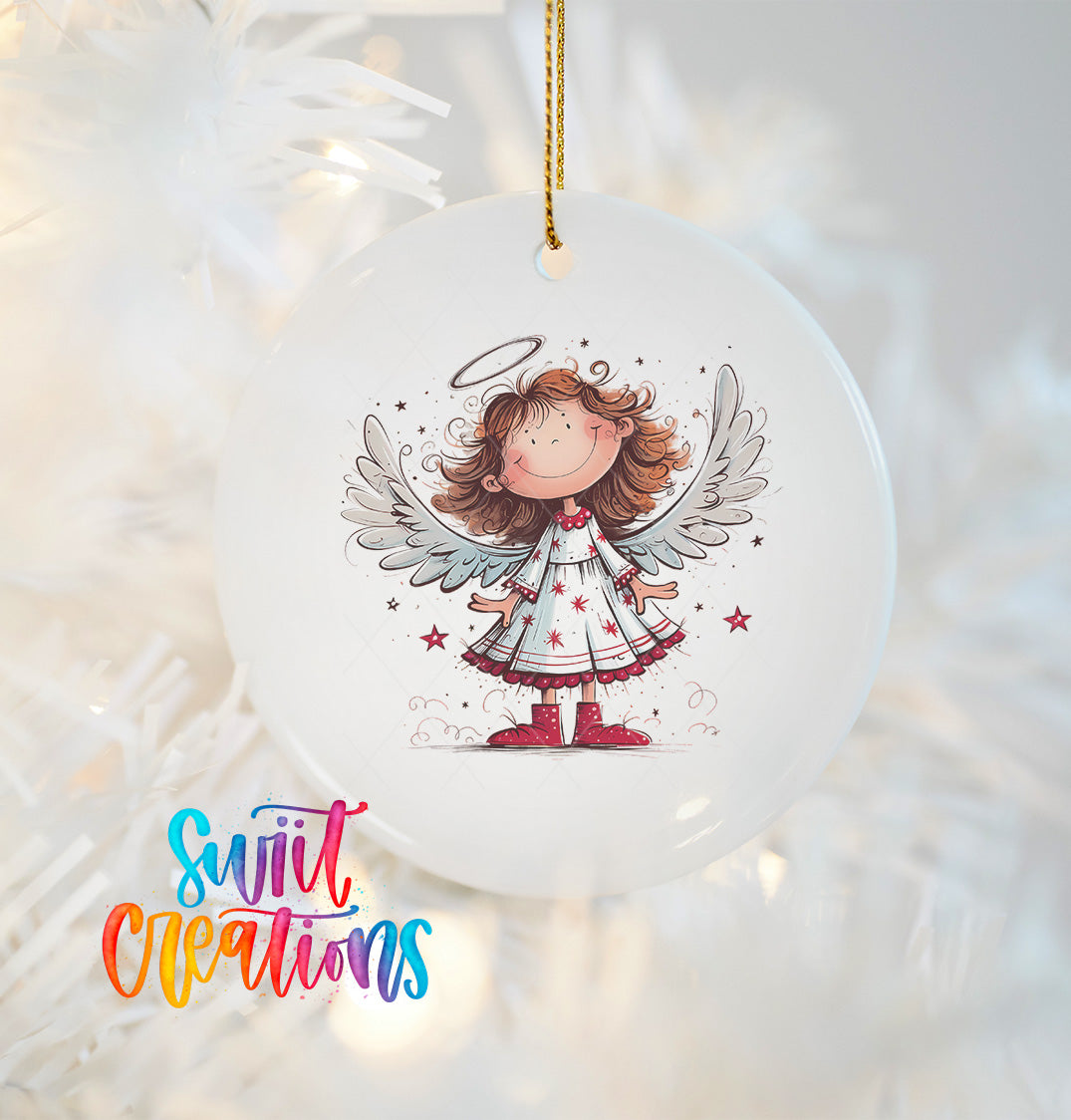 A white ceramic ornament featuring a cartoon illustration of an angel with wings and a halo, hanging on a Christmas tree.