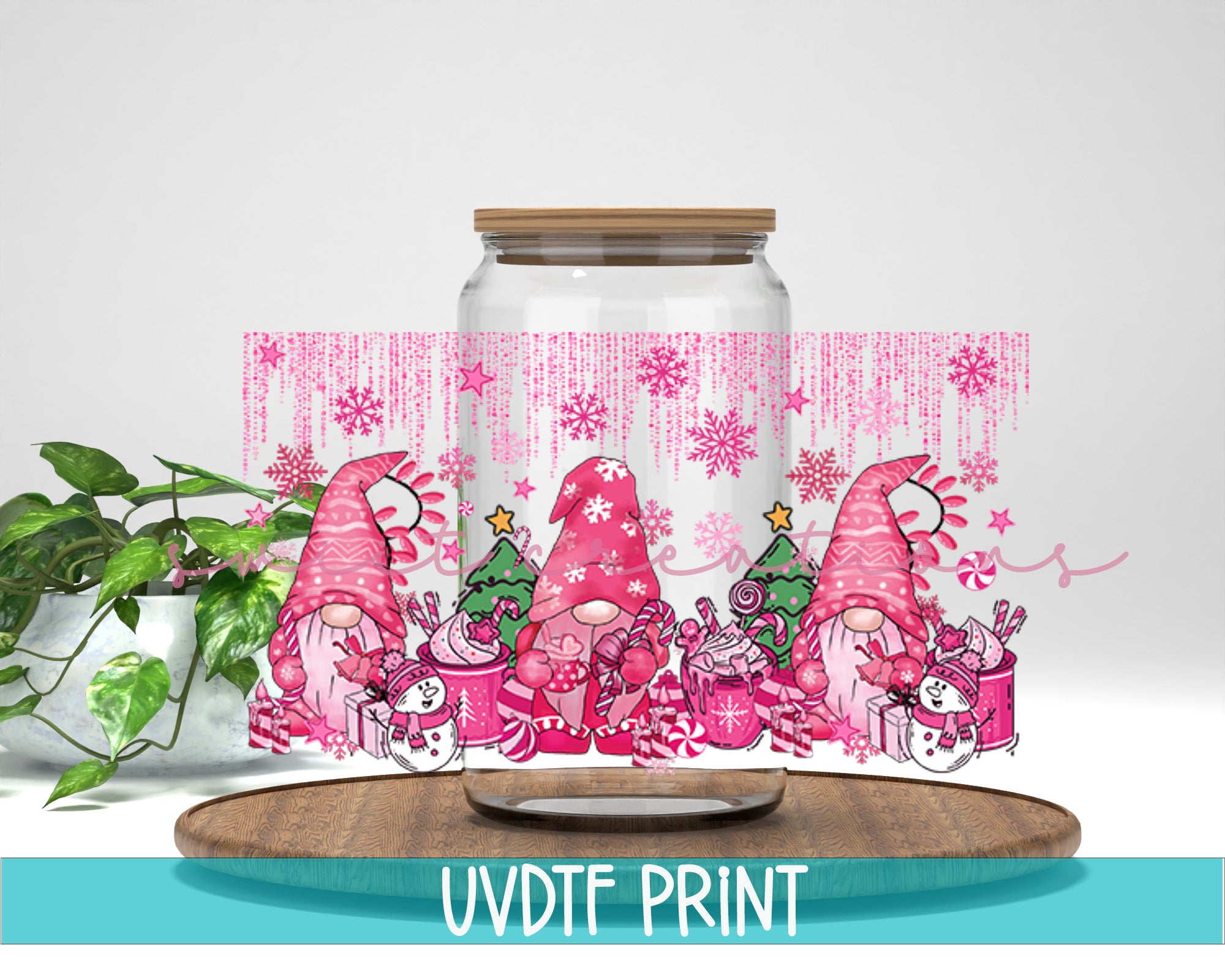 a glass jar filled with pink gnomes next to a potted plant