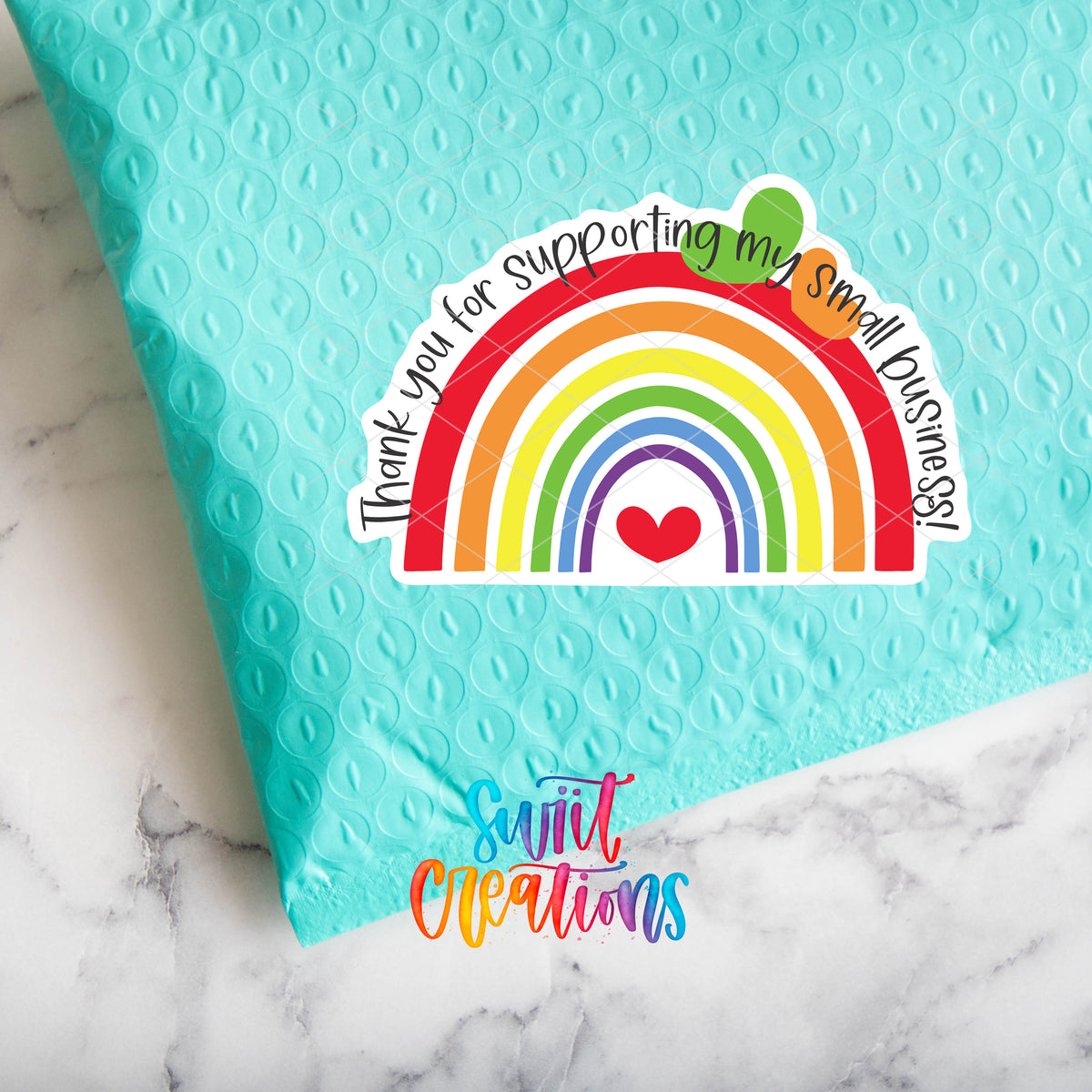 a blue bag with a rainbow sticker on it