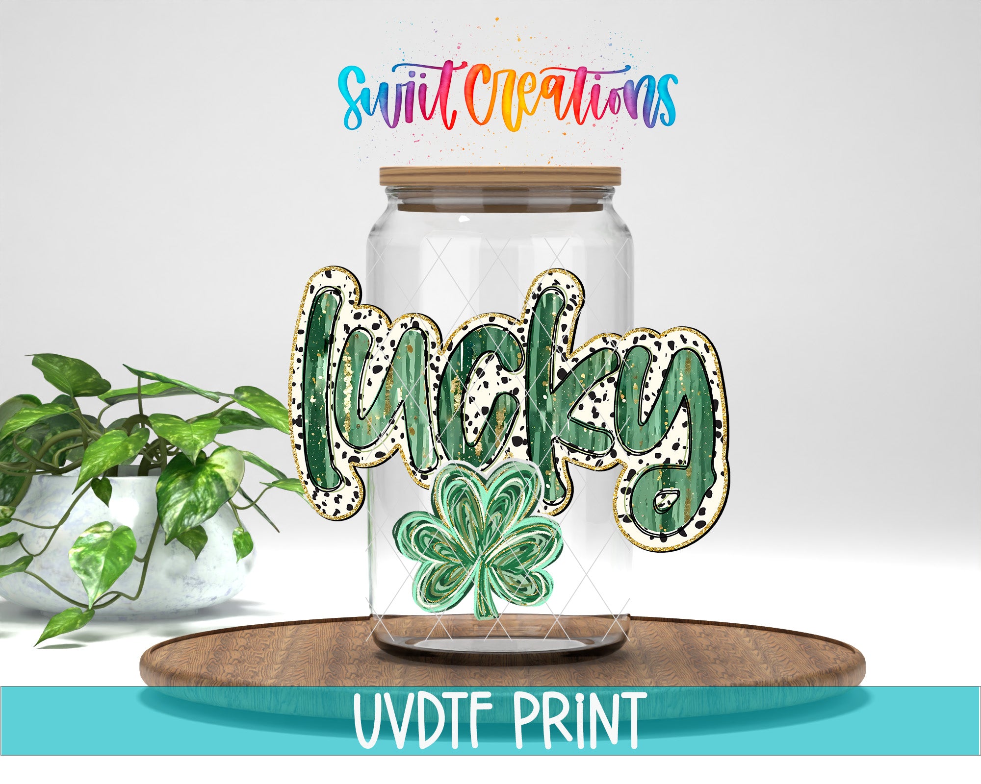 a glass jar with a cloverleaf design and the word "lucky" written on it, placed on a wooden surface.