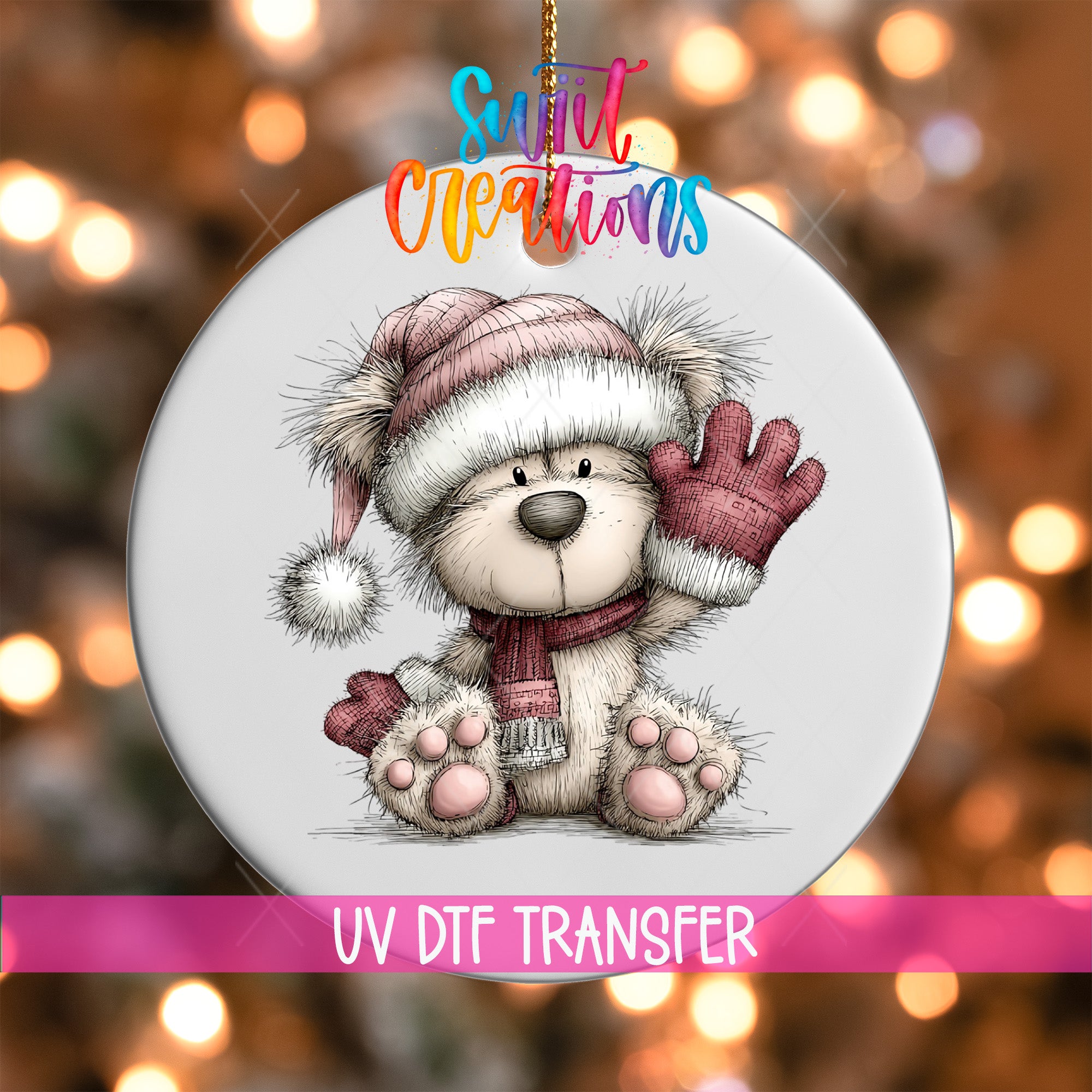 A white ceramic ornament featuring a cute teddy bear wearing a winter hat and scarf, with a pink ribbon around its neck.