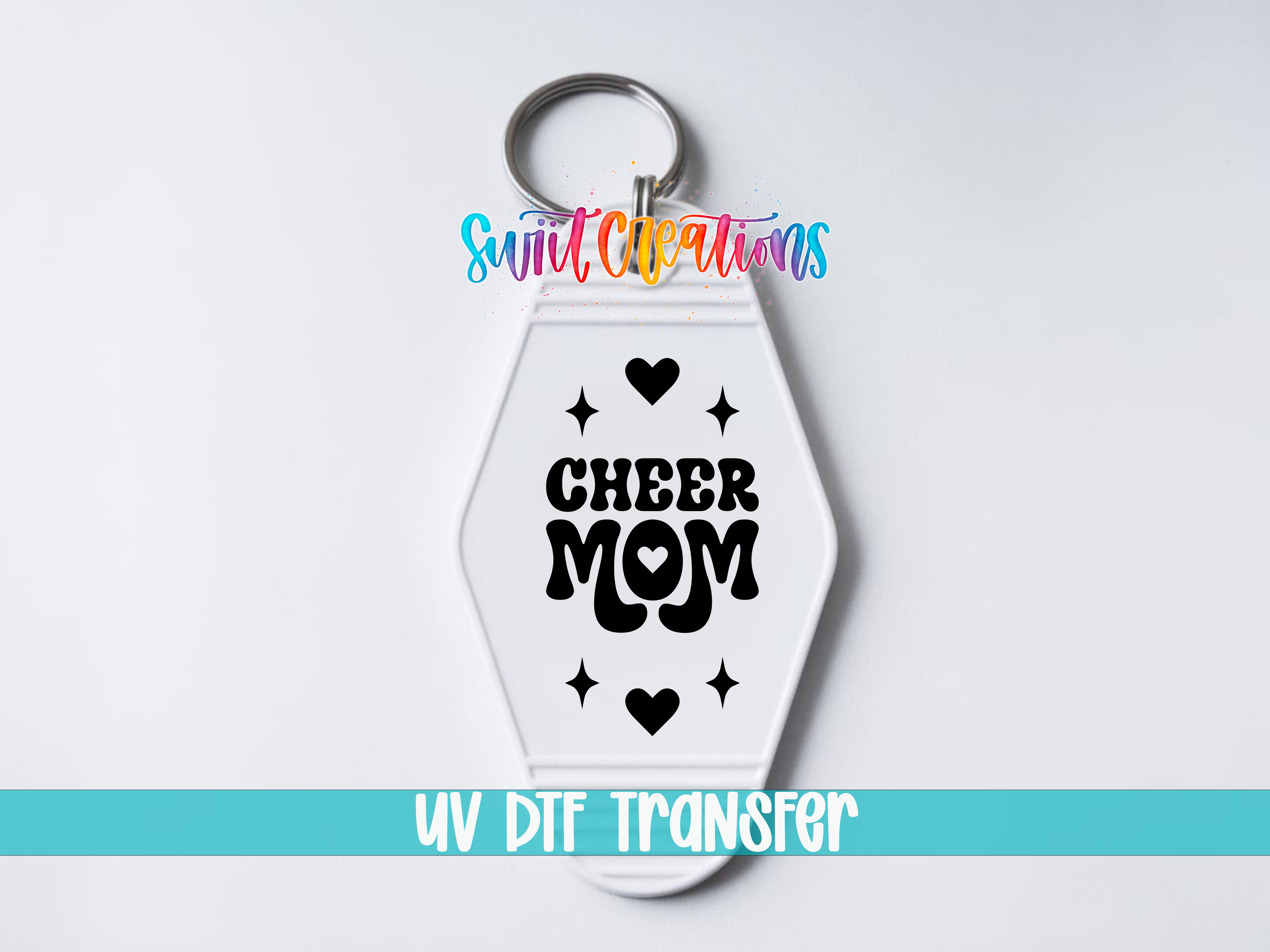 A keychain with a design that says "CHEER MOM" and stars, along with the text "UV DDF Transfer".