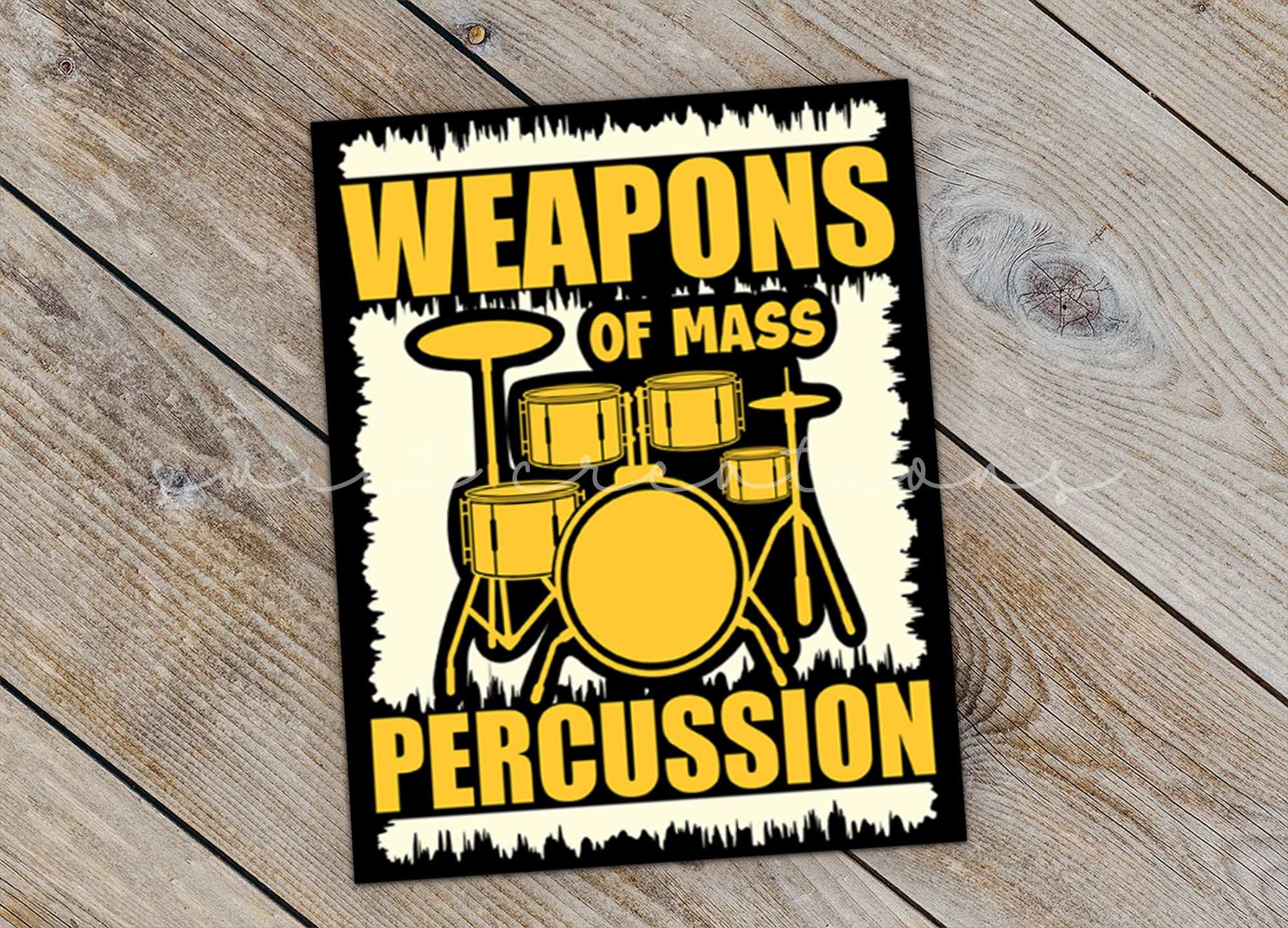 a sticker that says weapons of mass percussion
