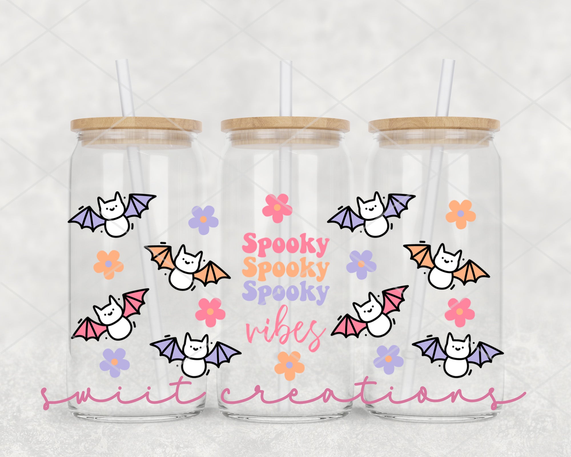a set of three personalized tumbles with a bat design