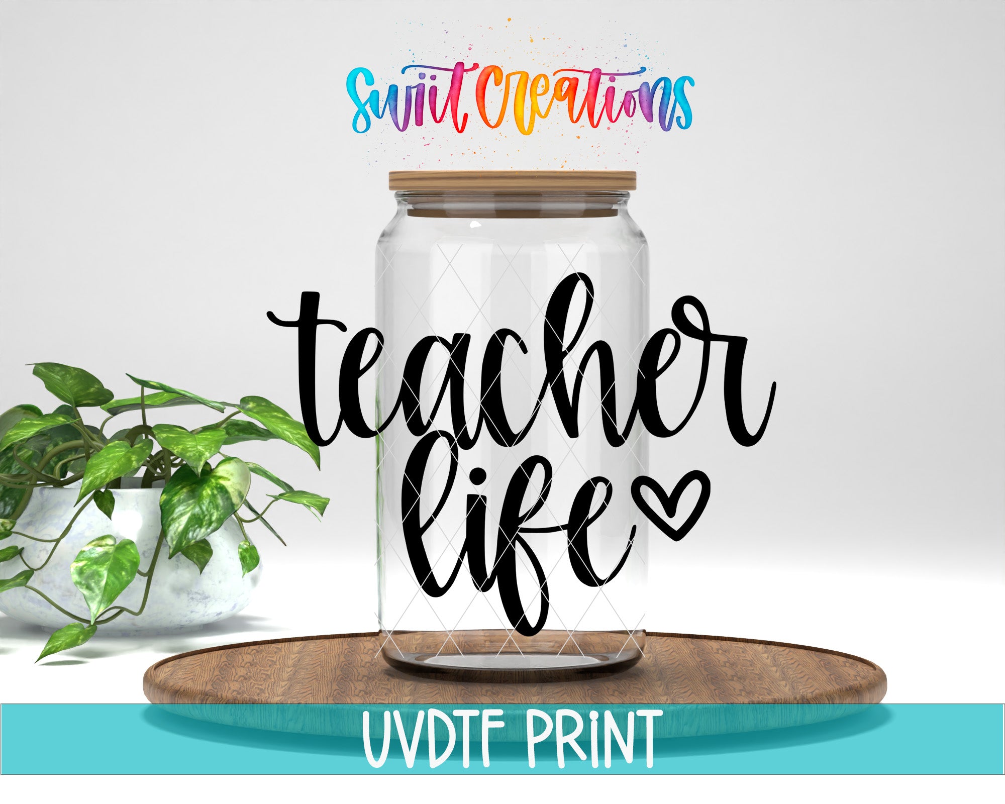 a glass jar with the words teacher life painted on it