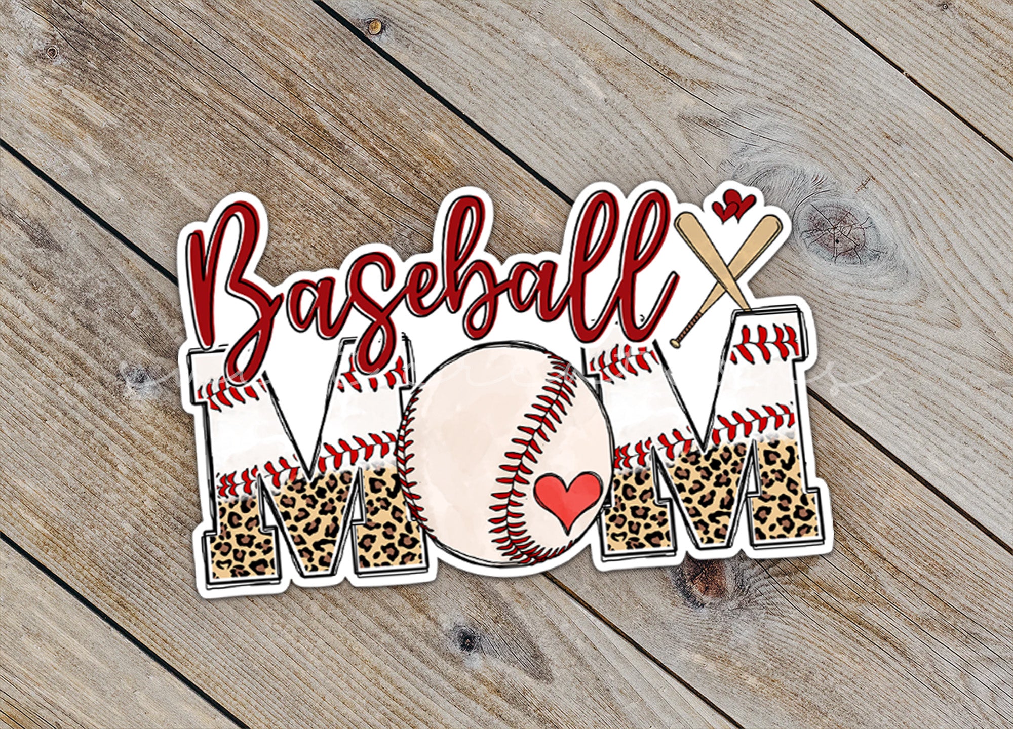 a baseball mom sticker on a wooden surface