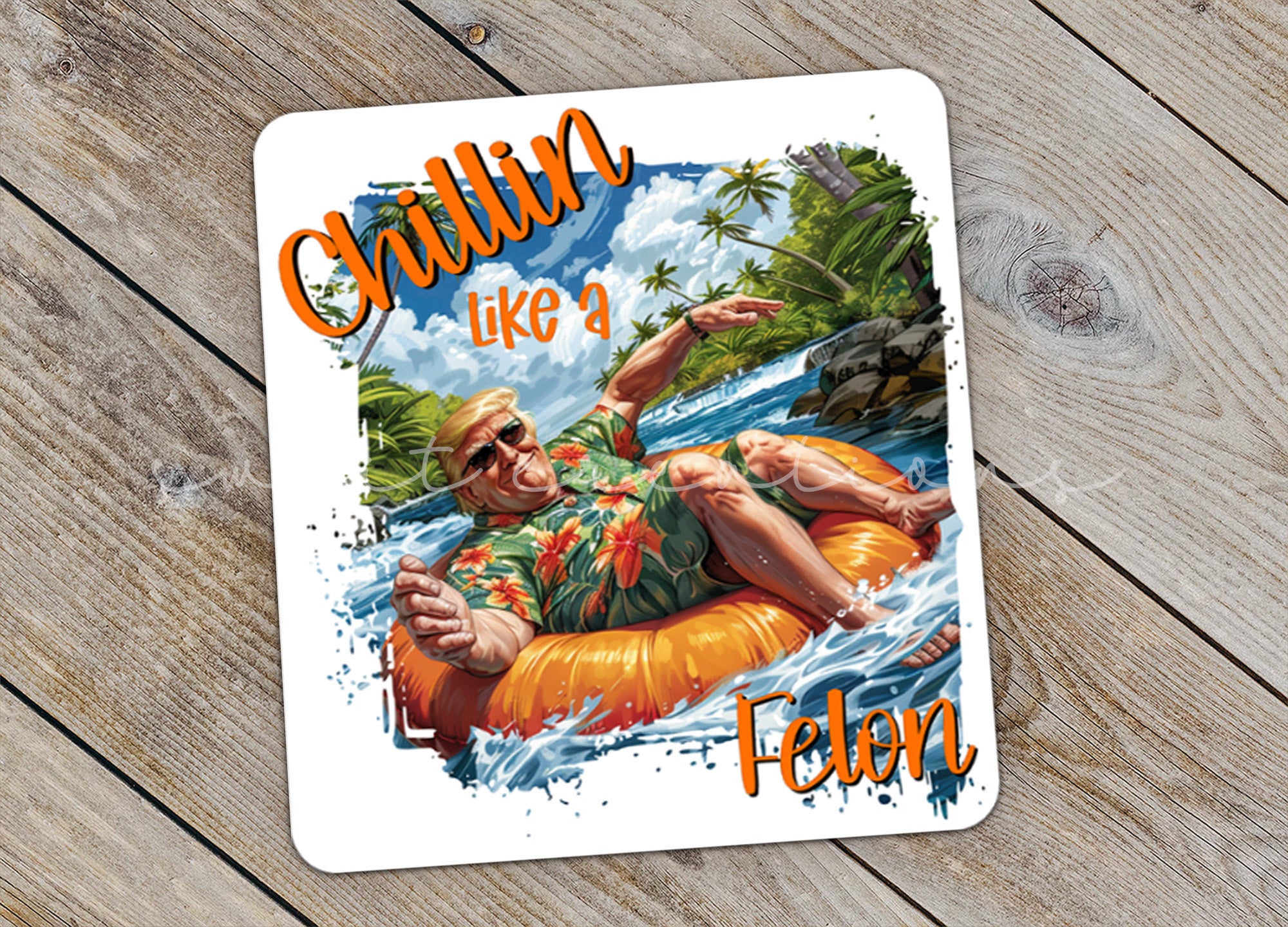 a card with a picture of a man floating on an inflatable raft