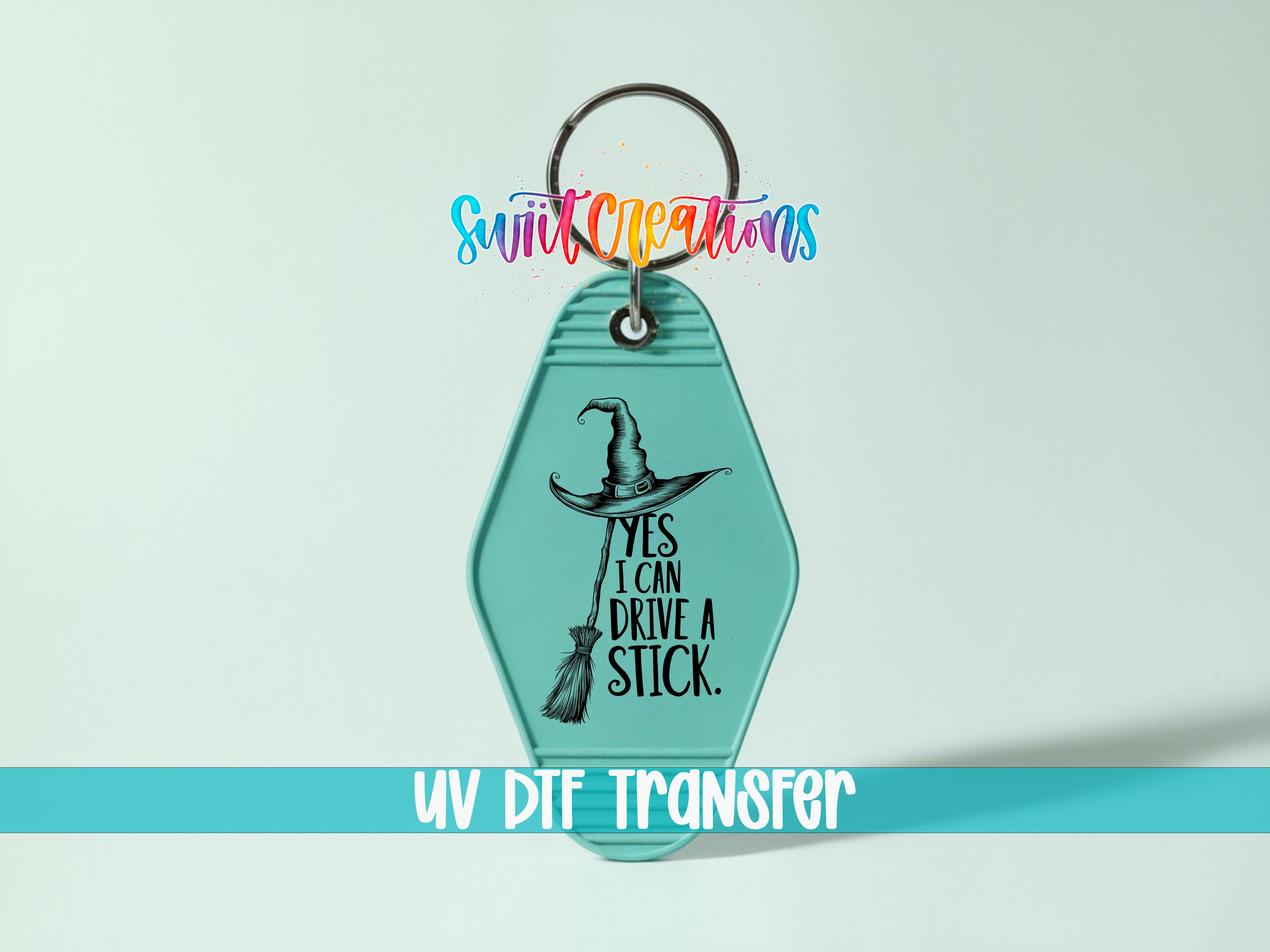 A keychain with a graphic design and text on it, along with a UV DIF transfer label.