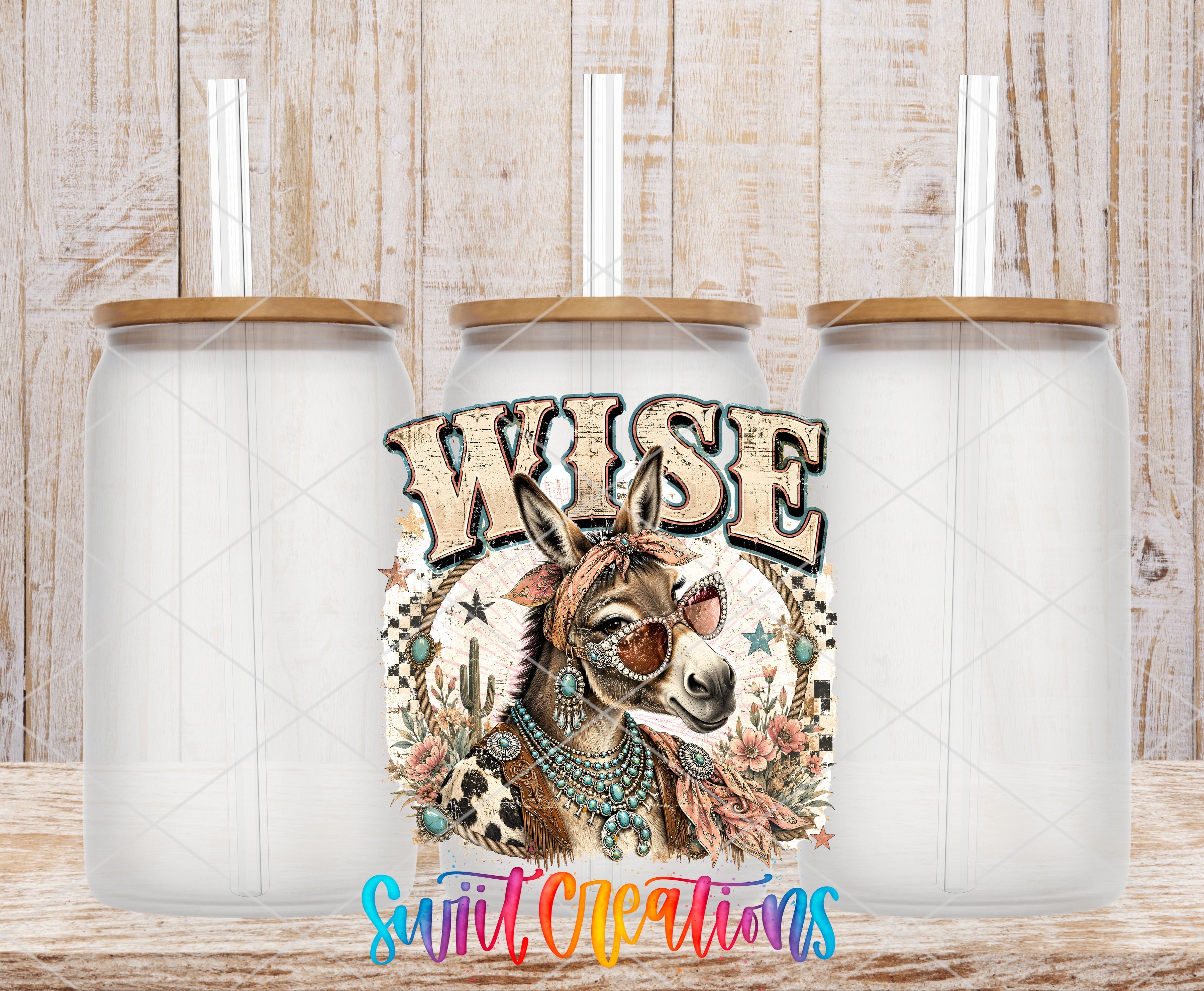 three glass jars with lids, each containing a straw. The jars are arranged in a row, and there is a colorful illustration of a donkey or mule in the center of the image. The donkey is wearing sunglasses and has a decorative headpiece. The text "WISE" is prominently displayed in the center of the image.