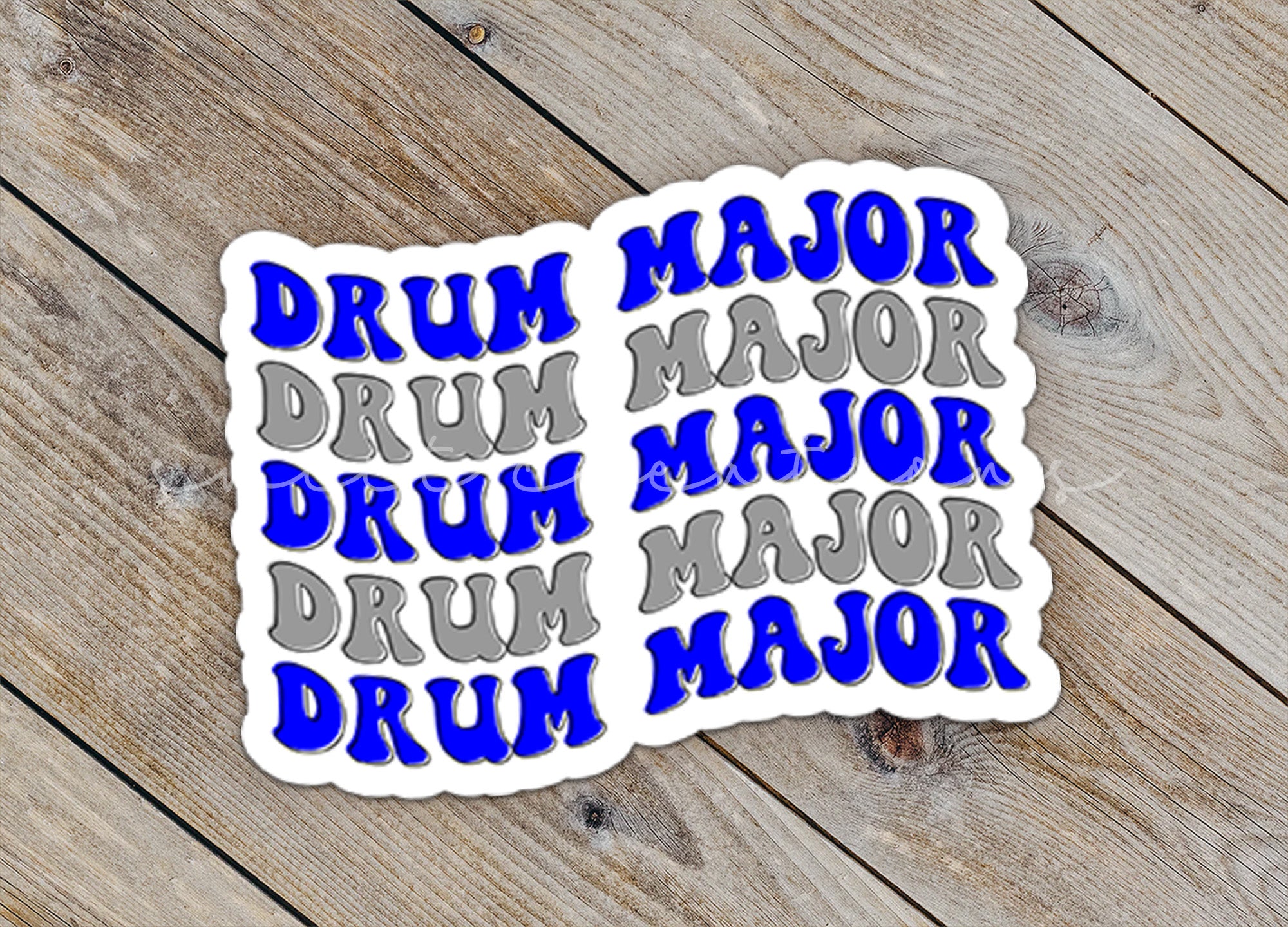 a sticker with the words drum major and drum major on it