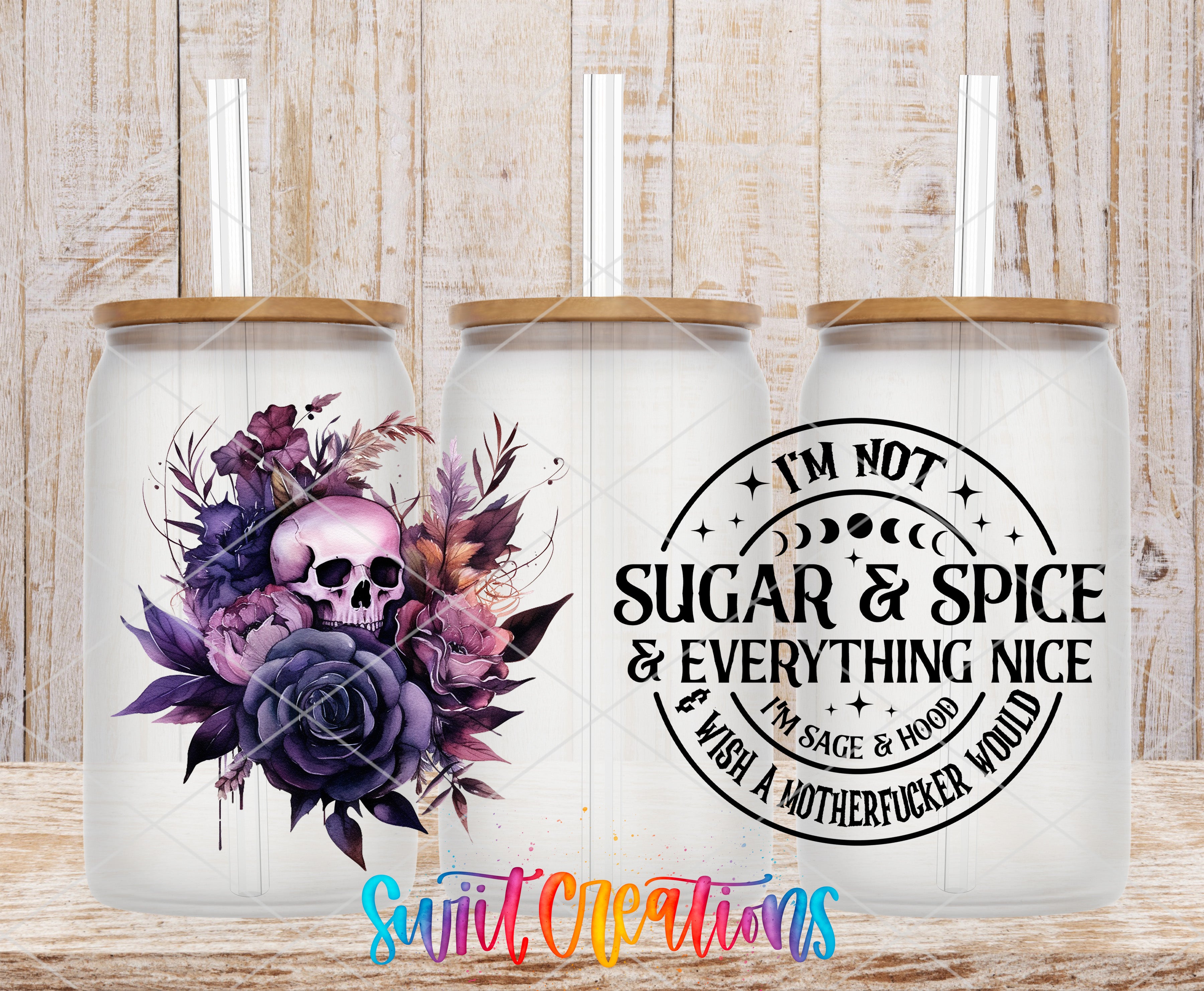 three glass jars with floral designs and text on them.