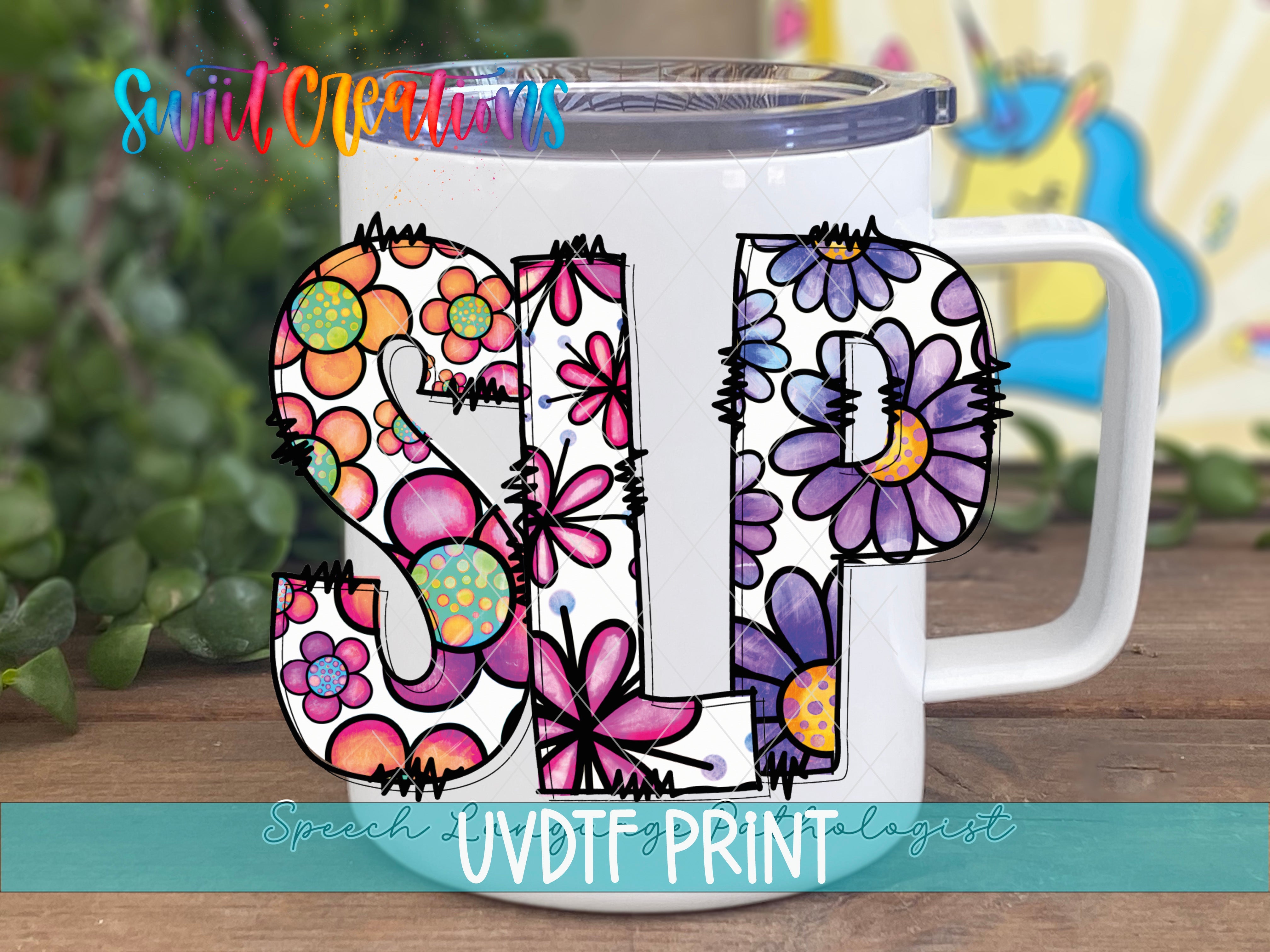 a white coffee mug with a floral design on it