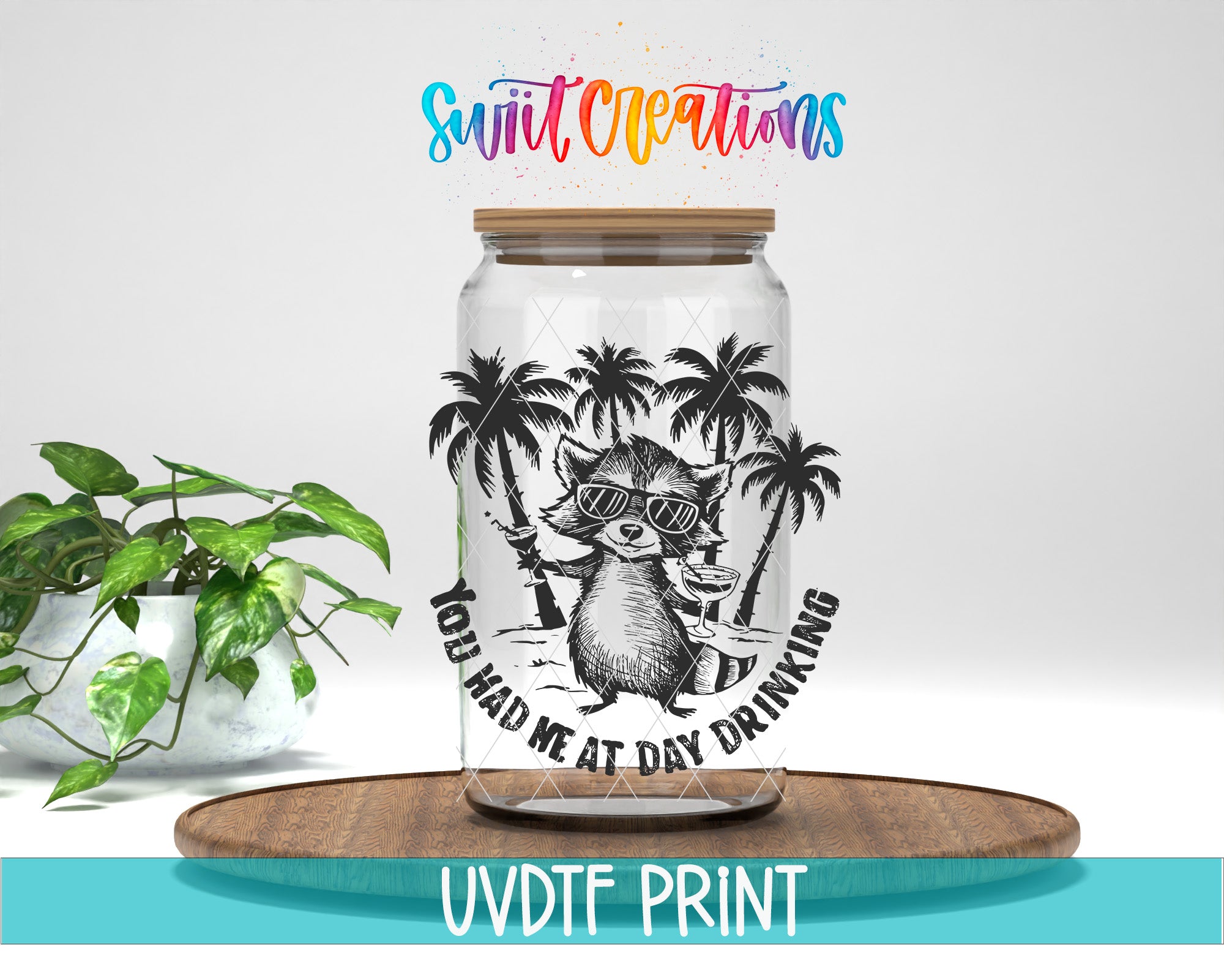 A glass jar with a raccoon wearing sunglasses and holding a drink, surrounded by palm trees, with the text "You Had Me at Day Drinking" printed on it.