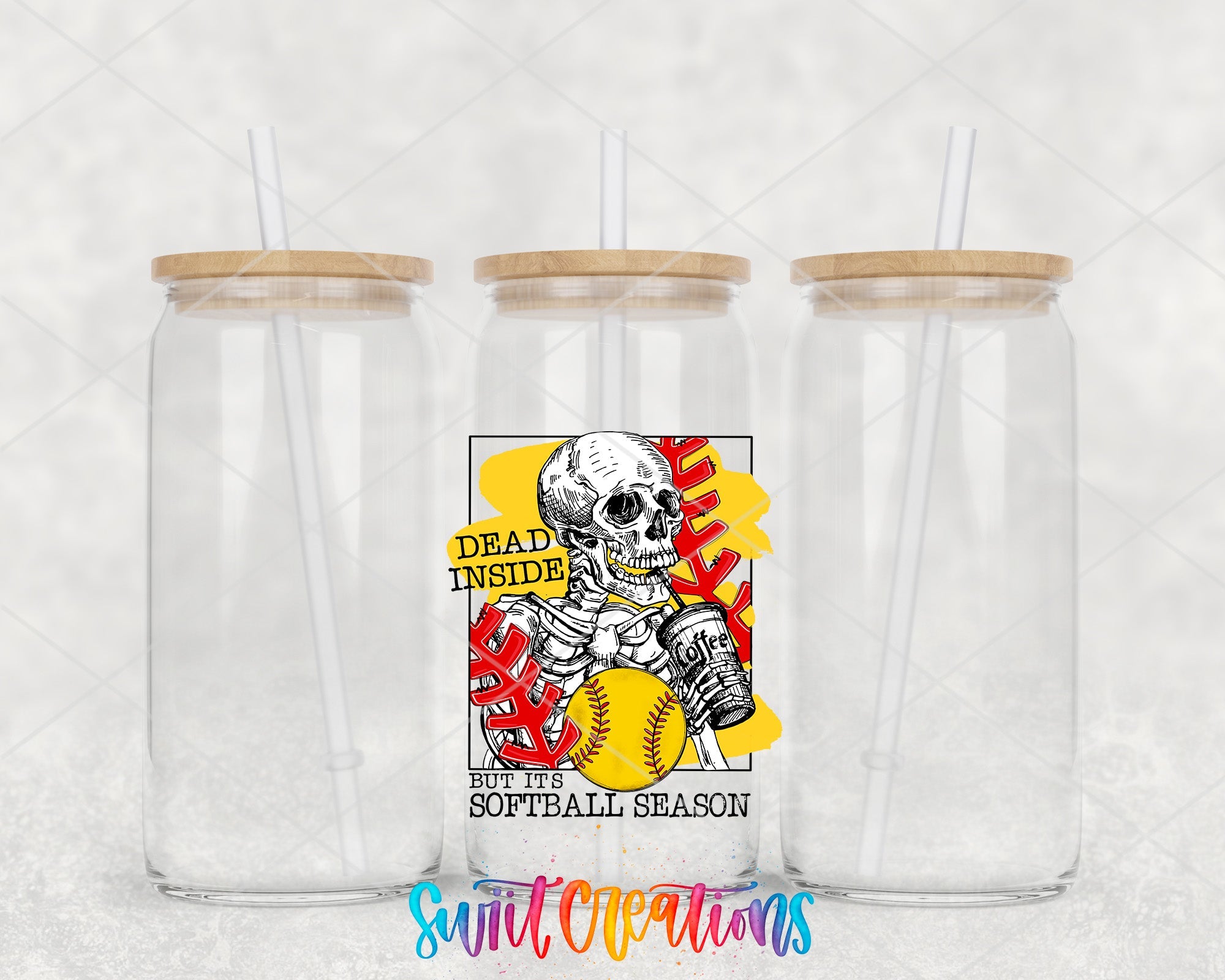 two clear tumblers with wooden lids with a skeleton on them