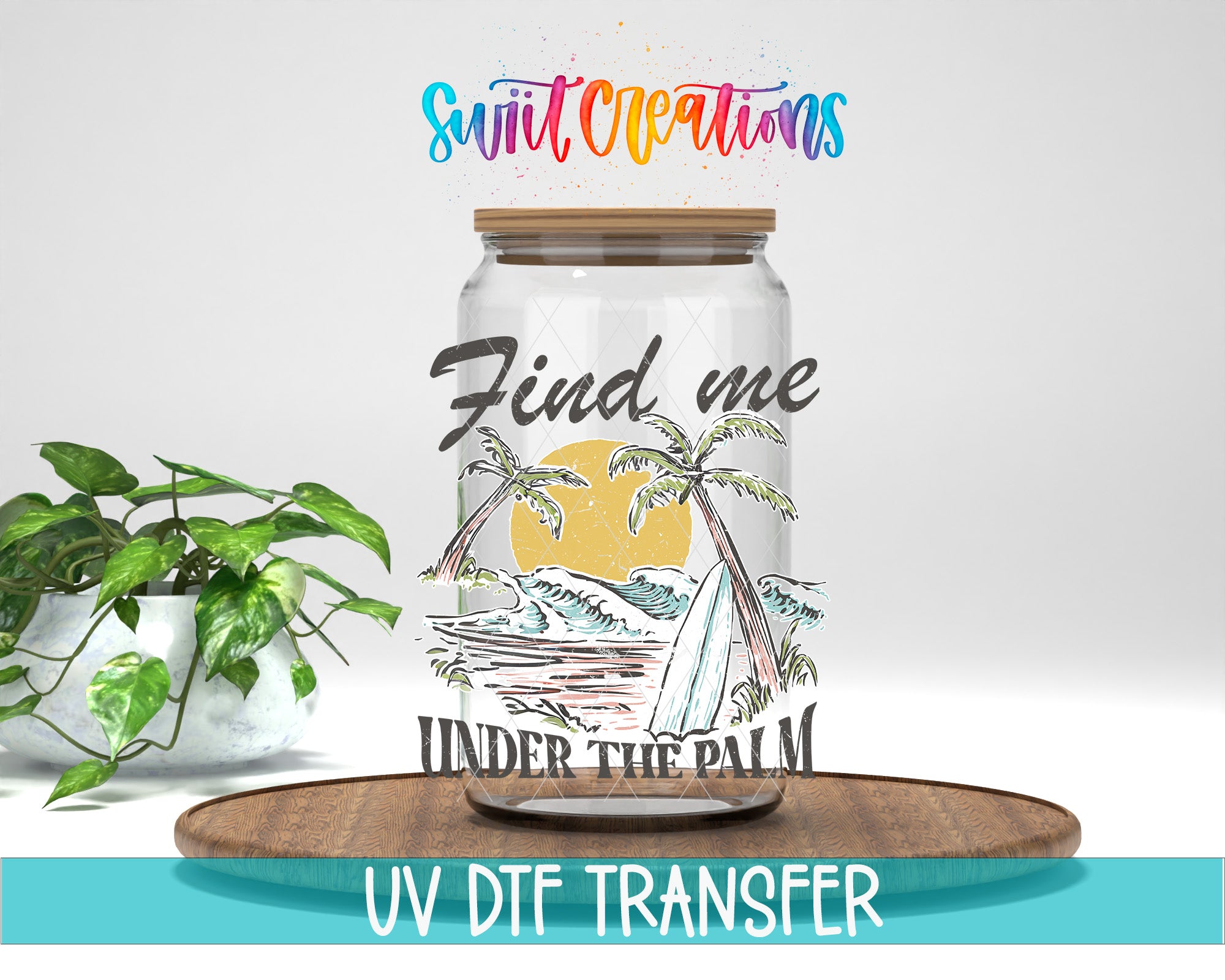 a glass jar with a tropical beach scene printed on it, along with the text "Find me under the palm" and "Under the palm" printed on it. The jar is placed on a wooden tray, and there is a potted plant in the background.