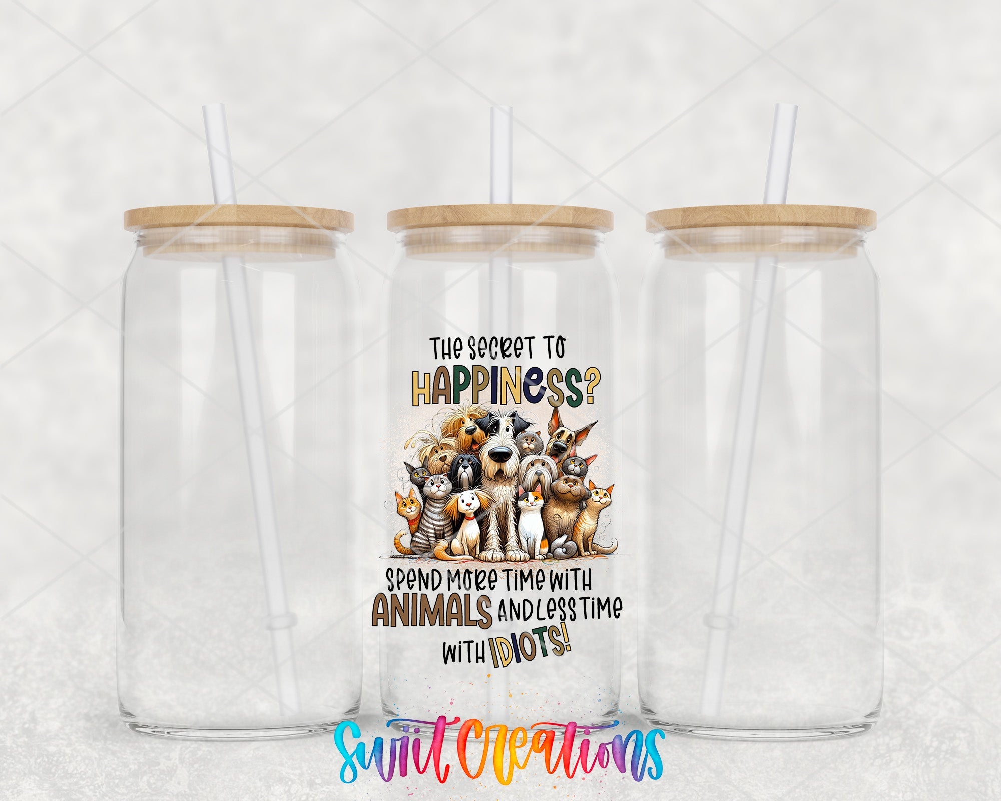 two clear tumblers with a picture of a group of animals on them