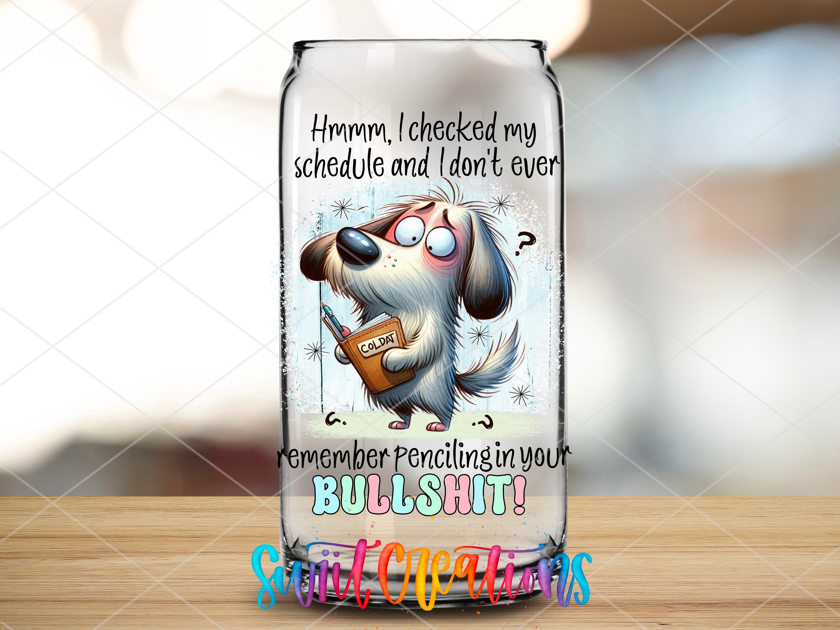 a glass jar with a cartoon dog holding a book