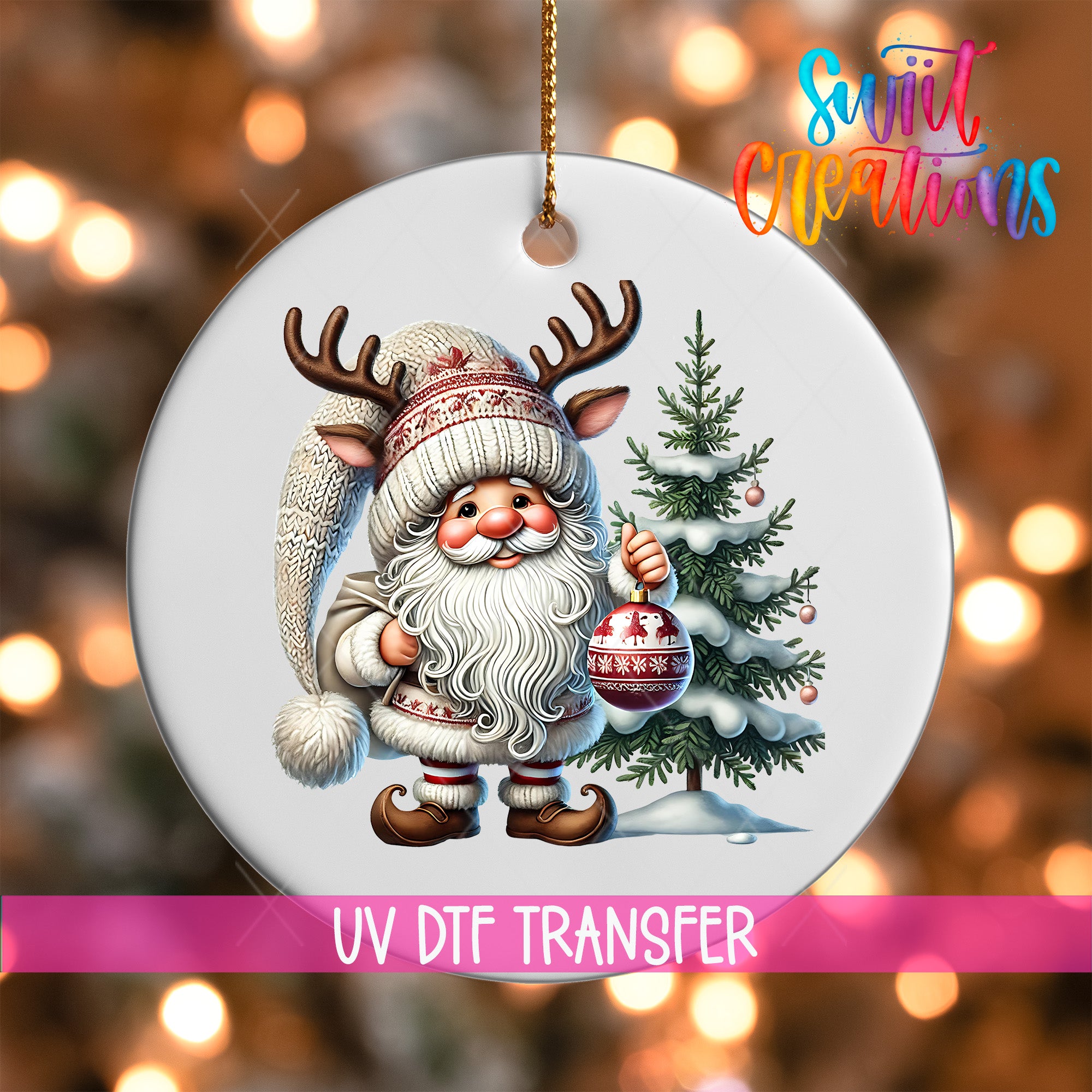 A white ornament featuring a Santa Claus figure holding a Christmas ornament and standing next to a decorated Christmas tree.