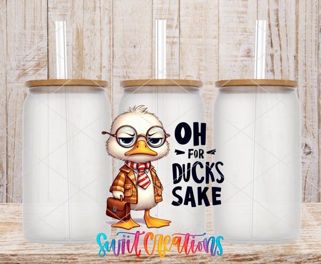 a pair of coffee mugs with a cartoon duck wearing glasses