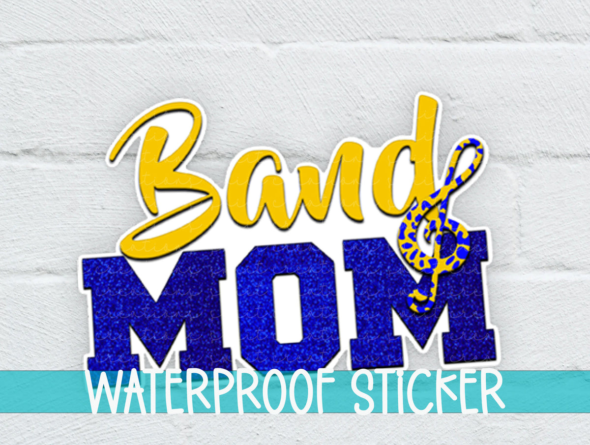 Gold and Blue Band Mom sticker on a white brick background with a waterproof sticker banner