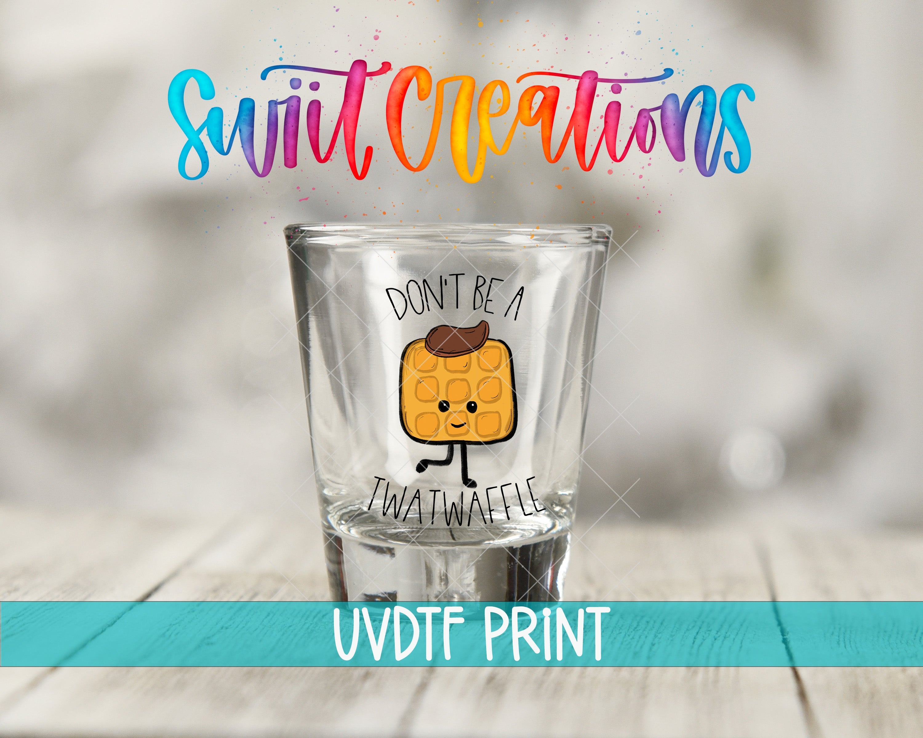 a shot glass with a picture of a toast on it