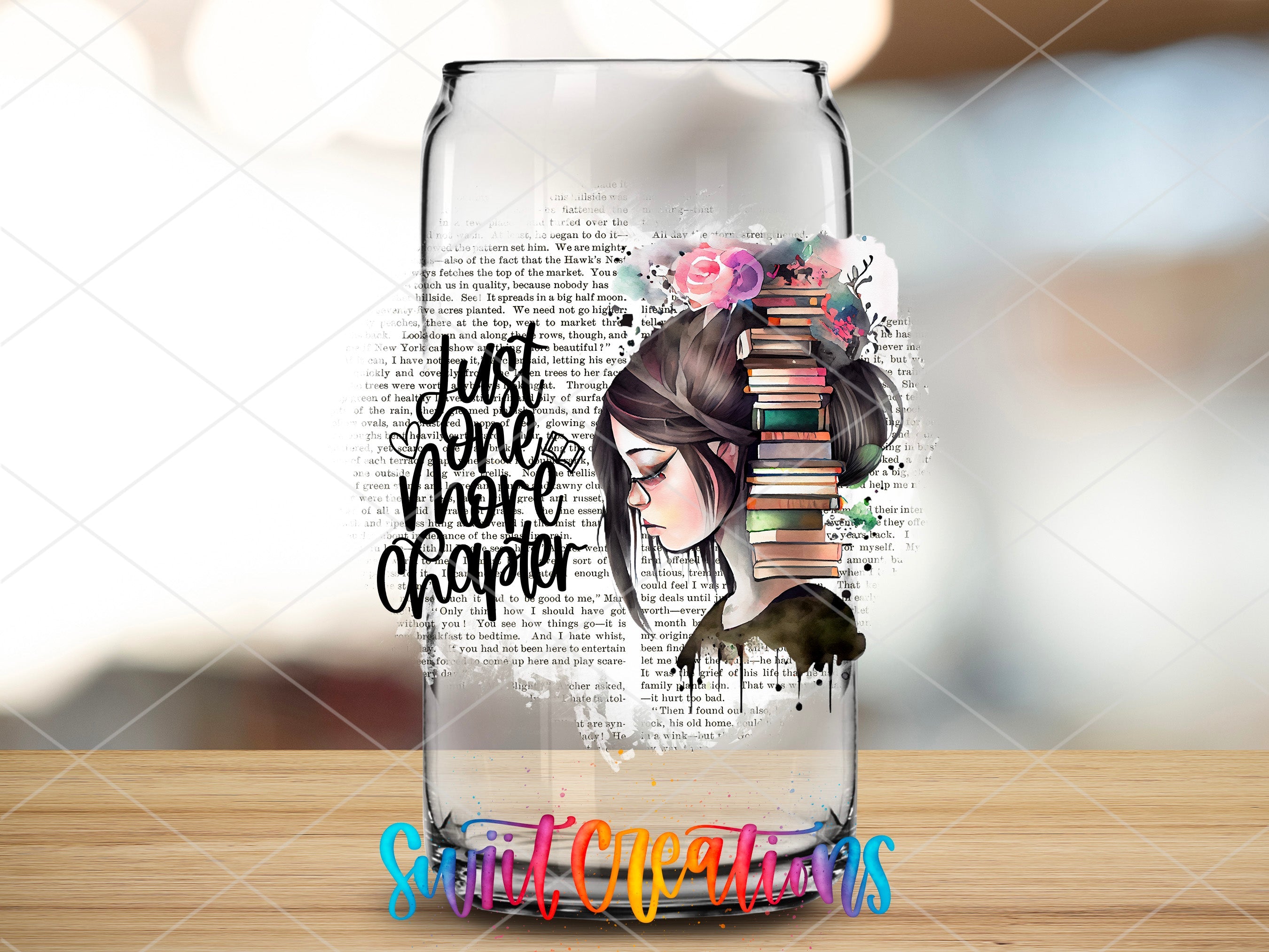 a glass with a picture of a girl with a book on it
