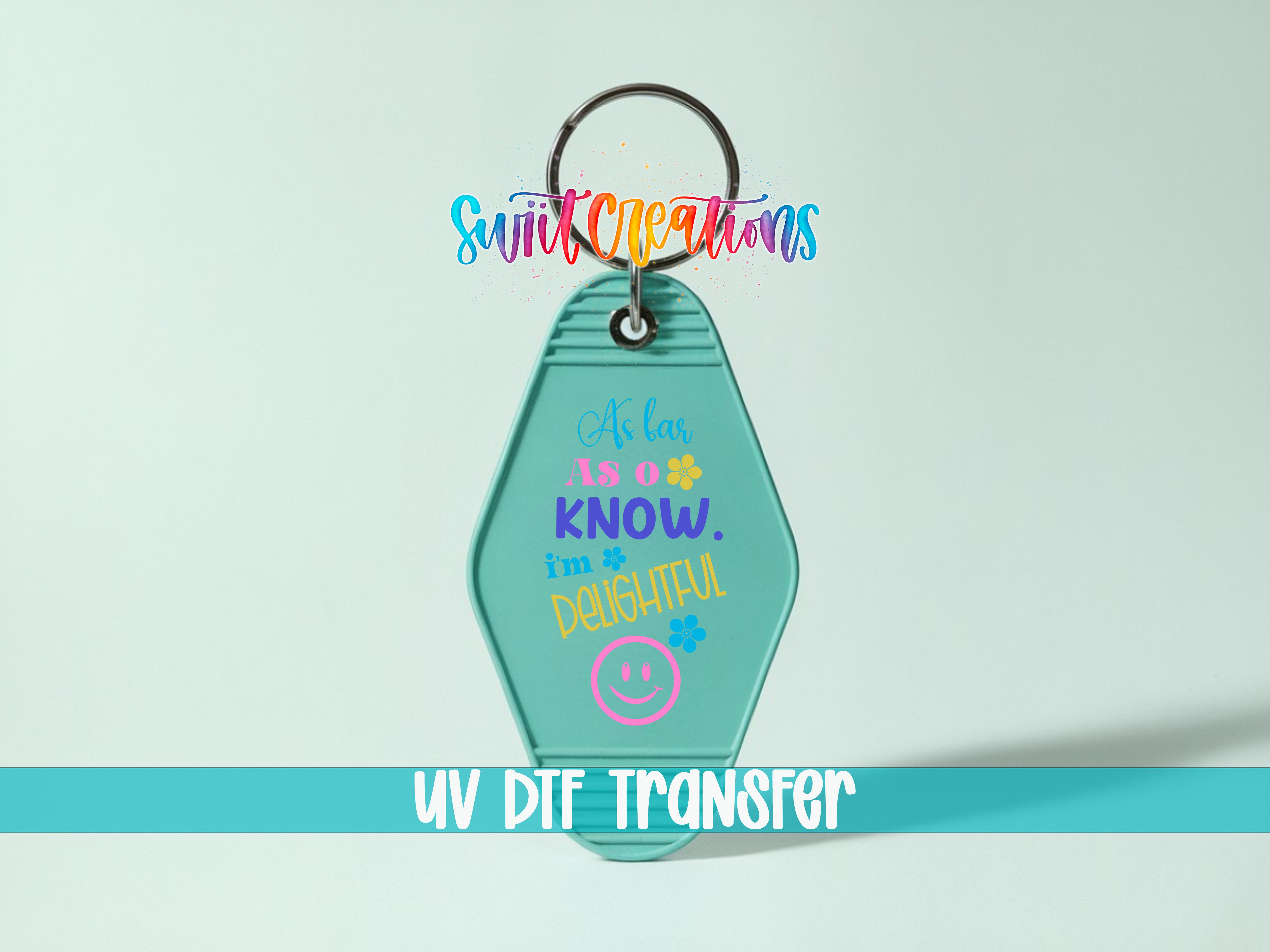 A keychain with a colorful design and text, including a smiley face and the phrase "As long as I know I'm beautiful".