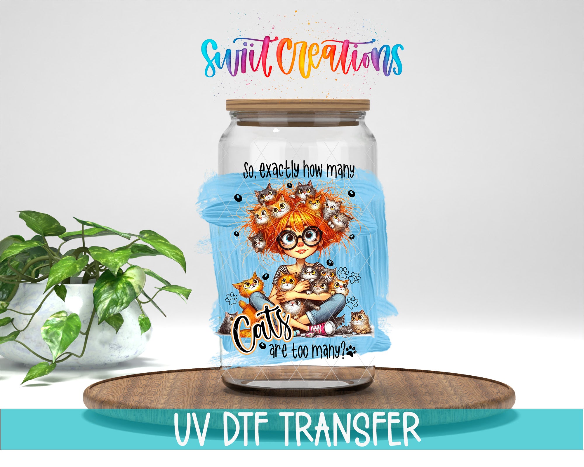 A glass jar with a label featuring a cartoon image of a cat surrounded by various cats, placed on a wooden surface next to a potted plant.