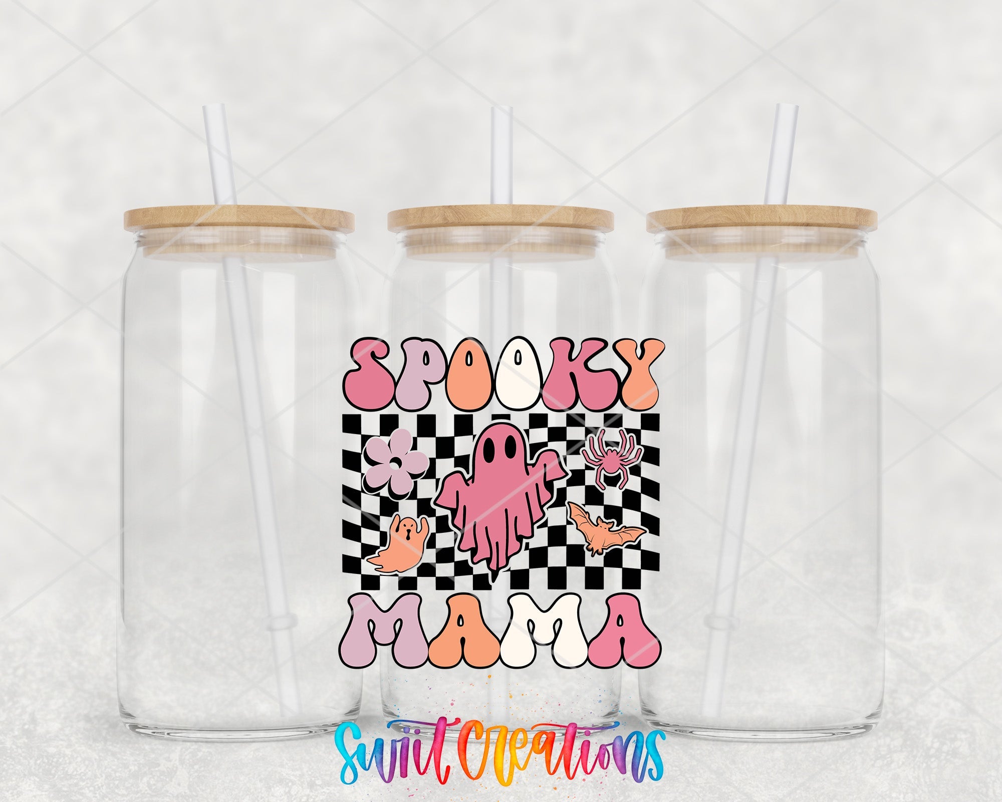 two plastic cups with straws in front of a checkered background