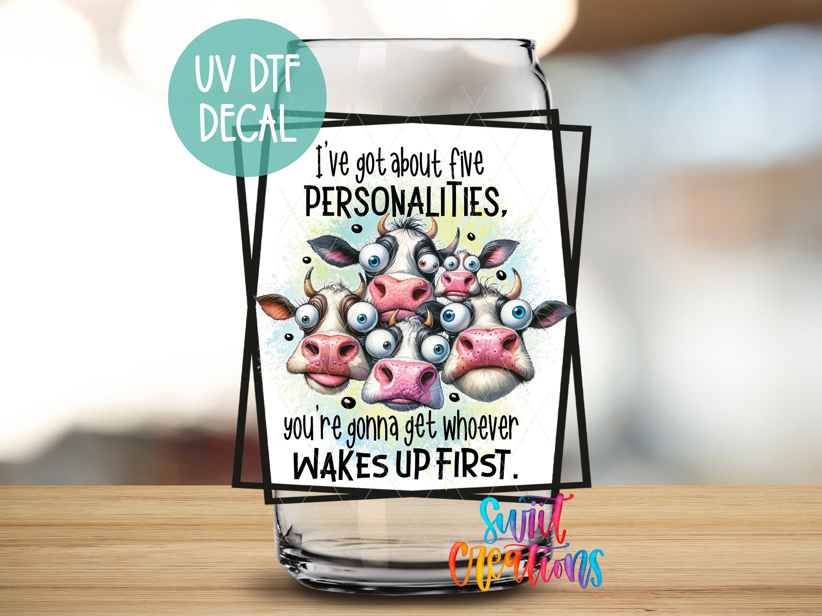 a glass with a picture of a cow on it