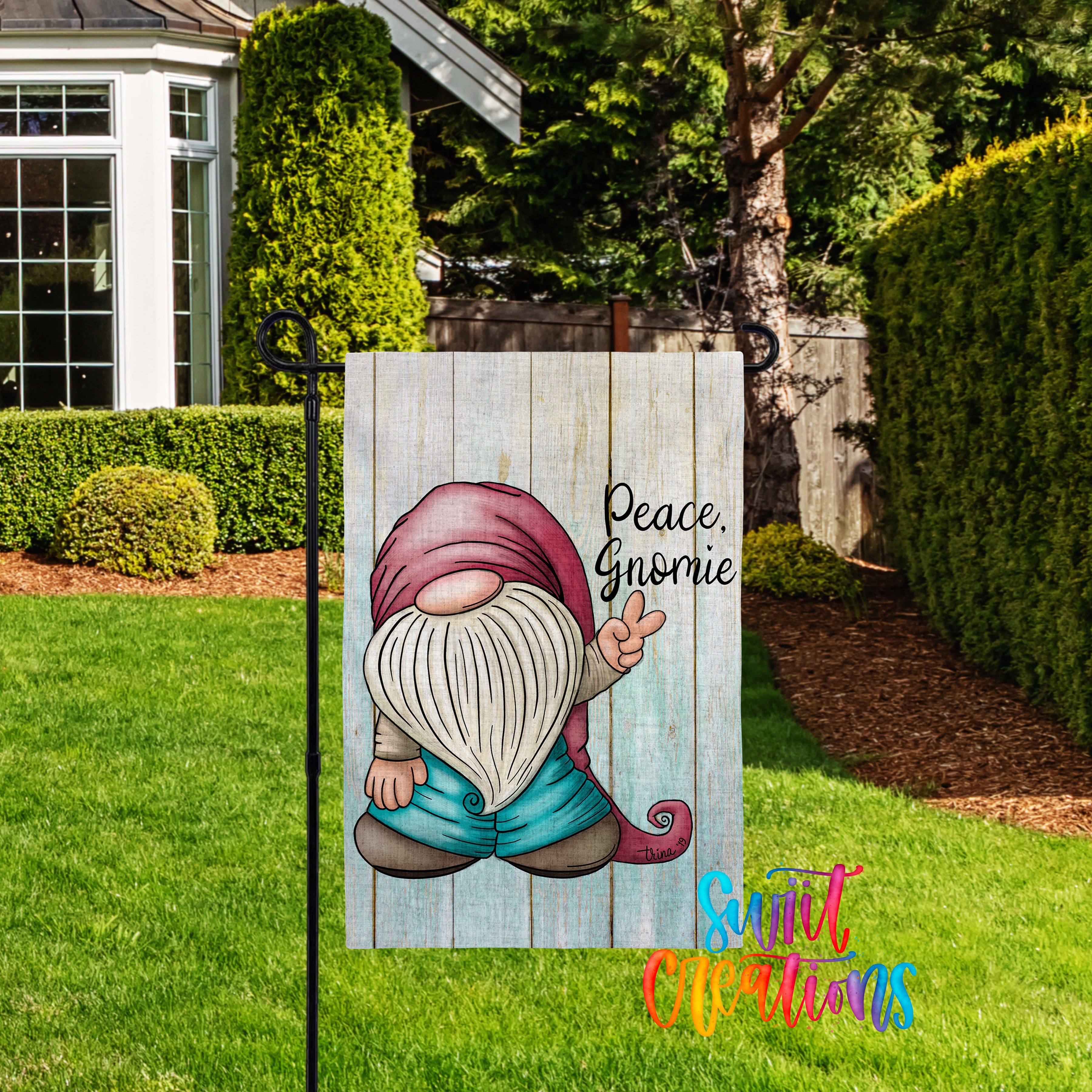 A wooden garden sign featuring a gnome holding a peace sign, with the text "Peace, Gnome" written on it.