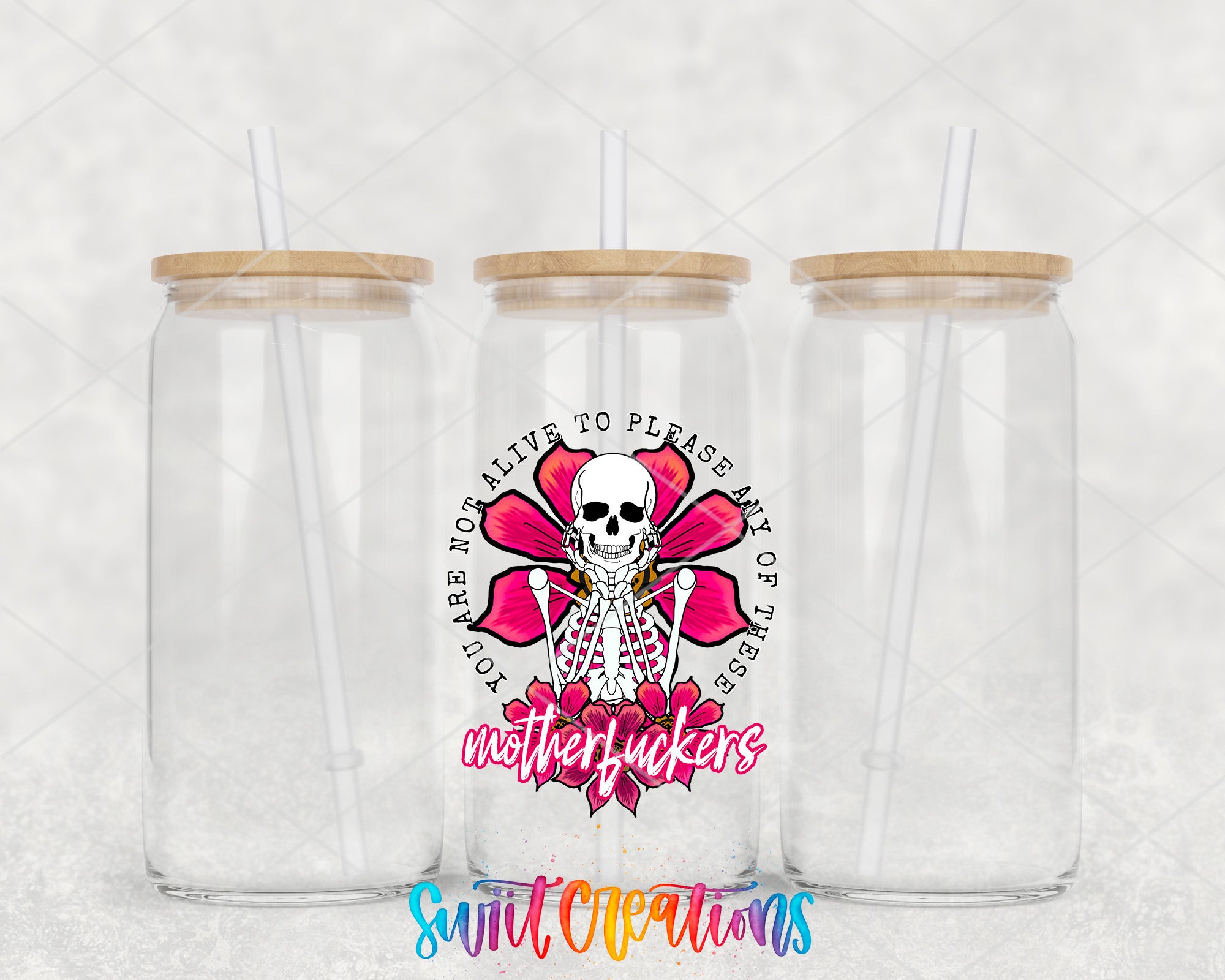 two clear tumblers with a skull on the side