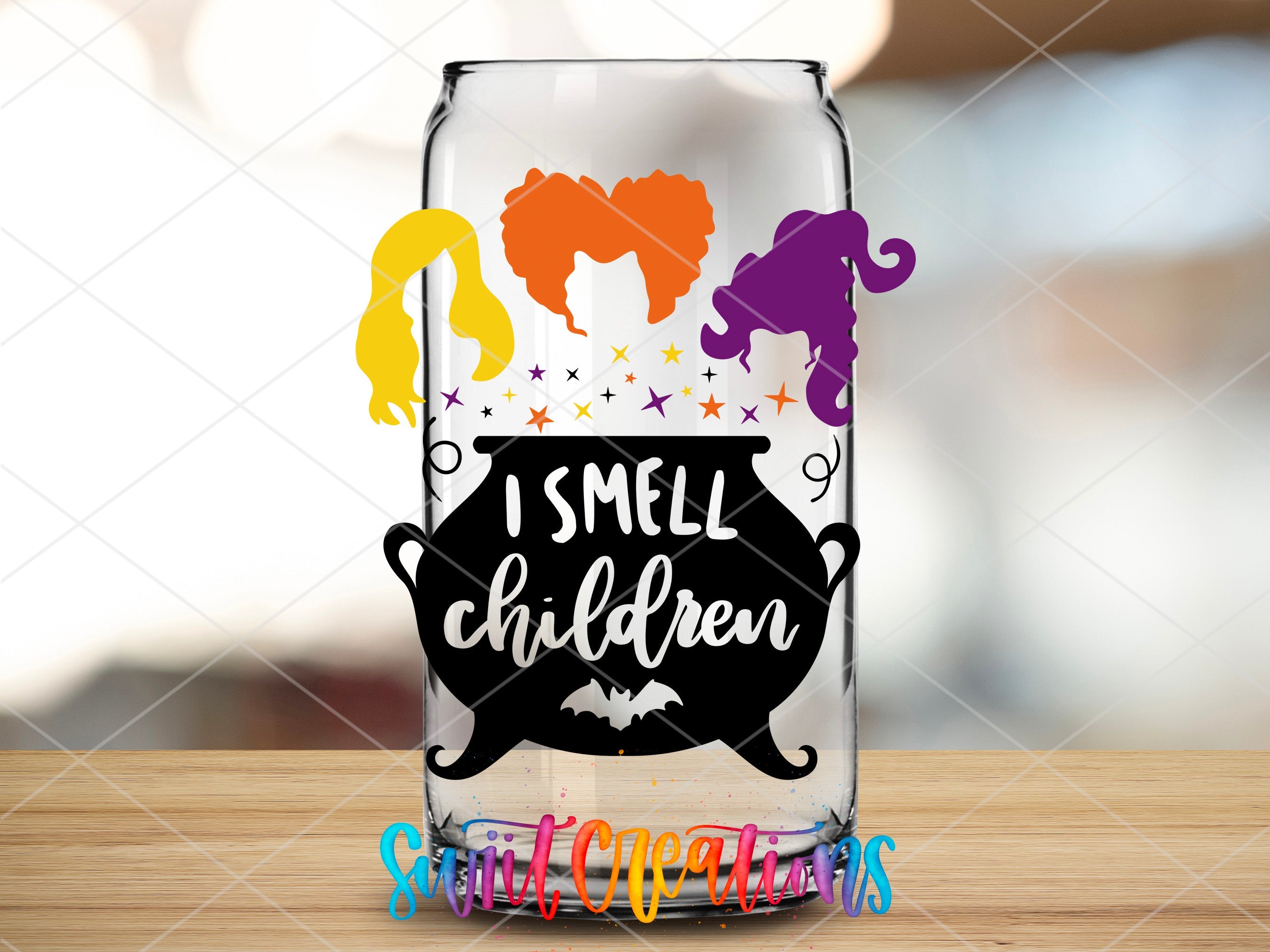 a glass with a halloween saying on it