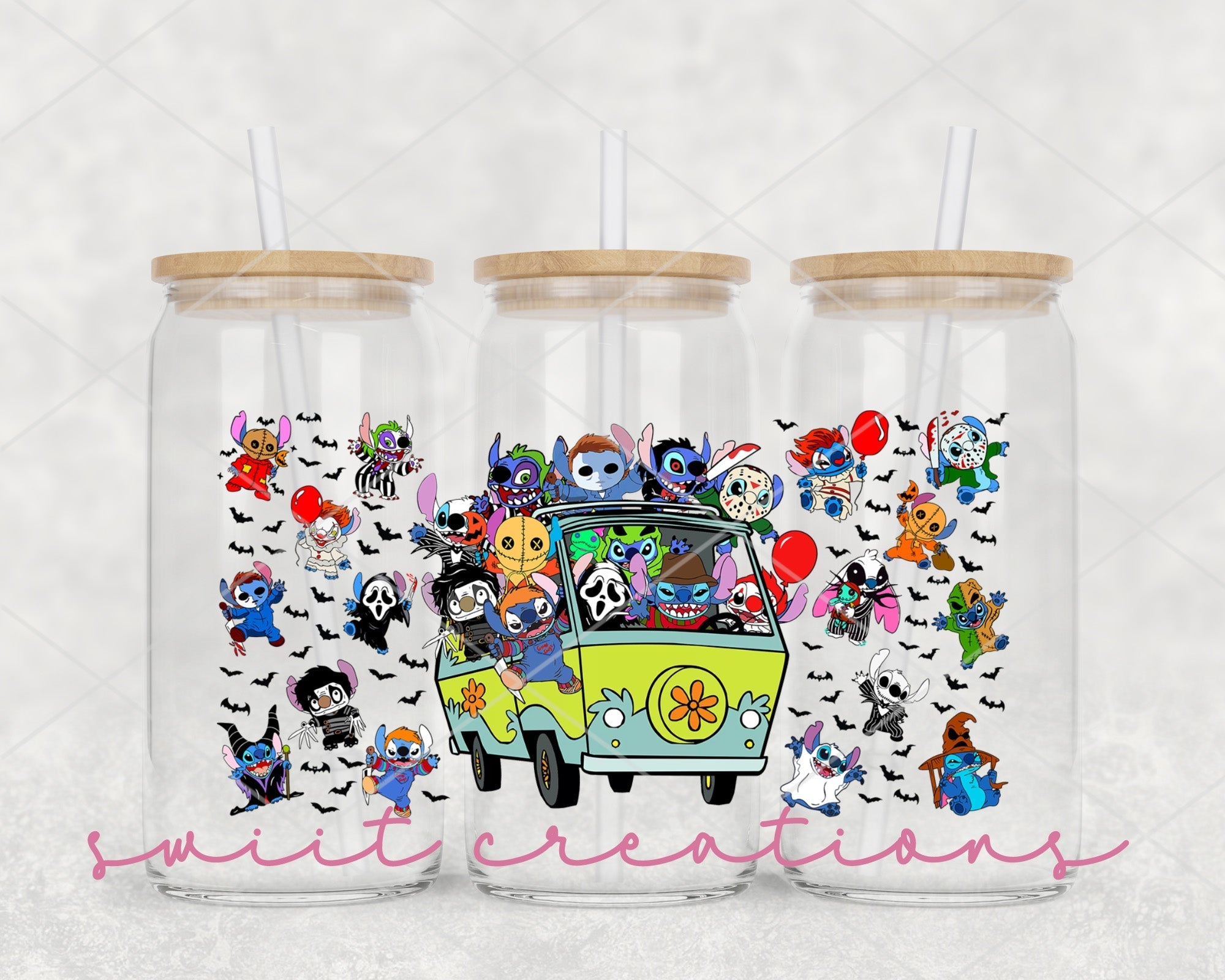 a set of two tumblers with cartoon characters on them