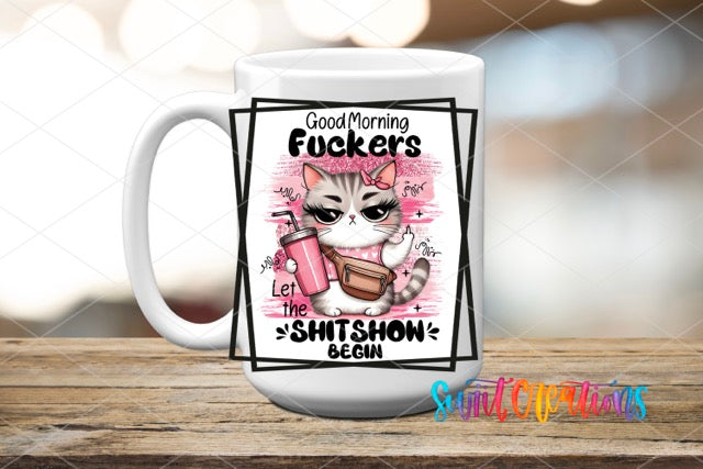 a coffee mug with a picture of a cat on it