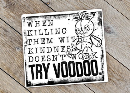 Close-up of the Try Voodoo sticker on rustic wood