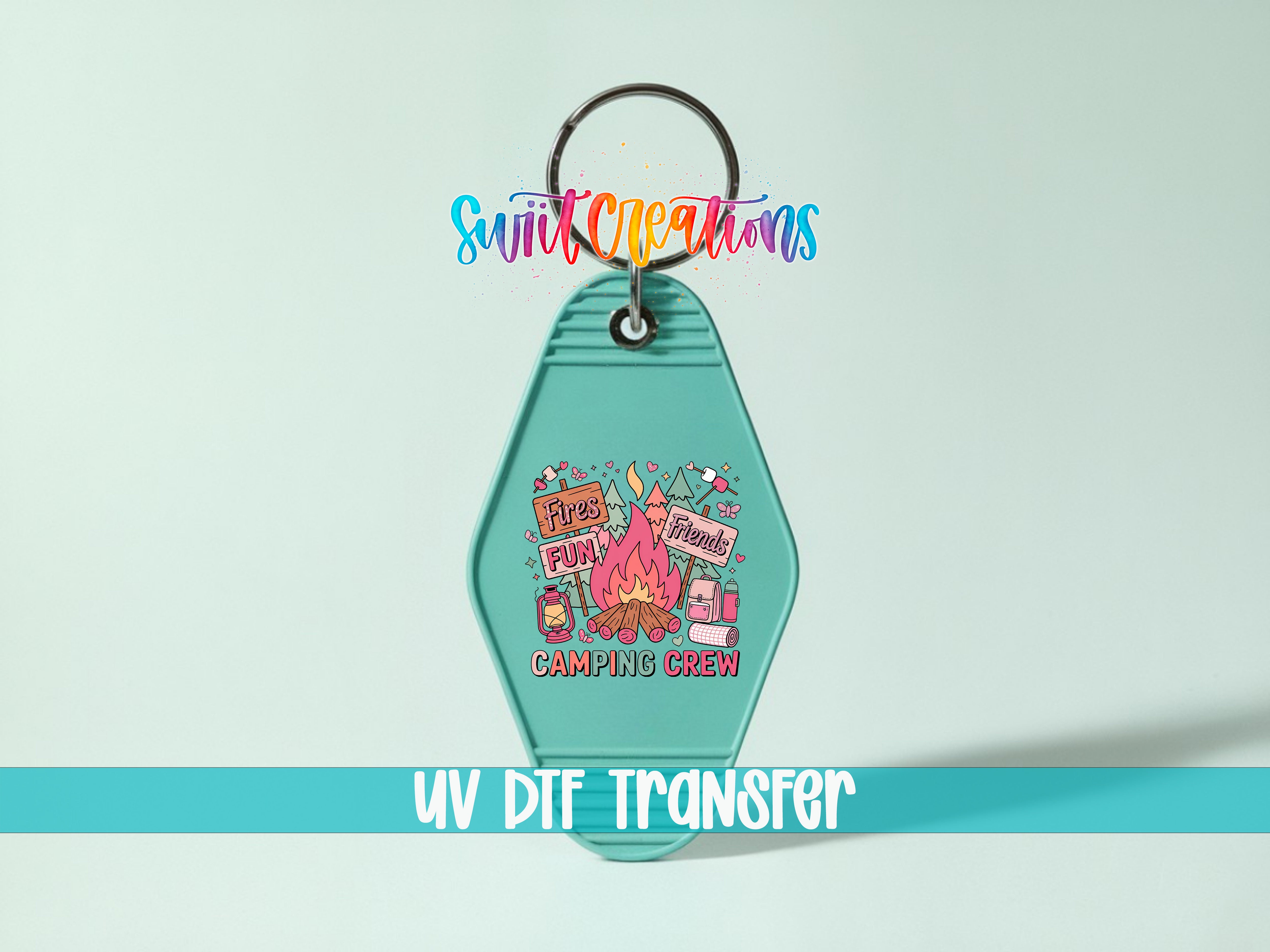 A keychain with a colorful design featuring a campfire, camping equipment, and text that says "Please Fun Fun Friends Camping Crew".