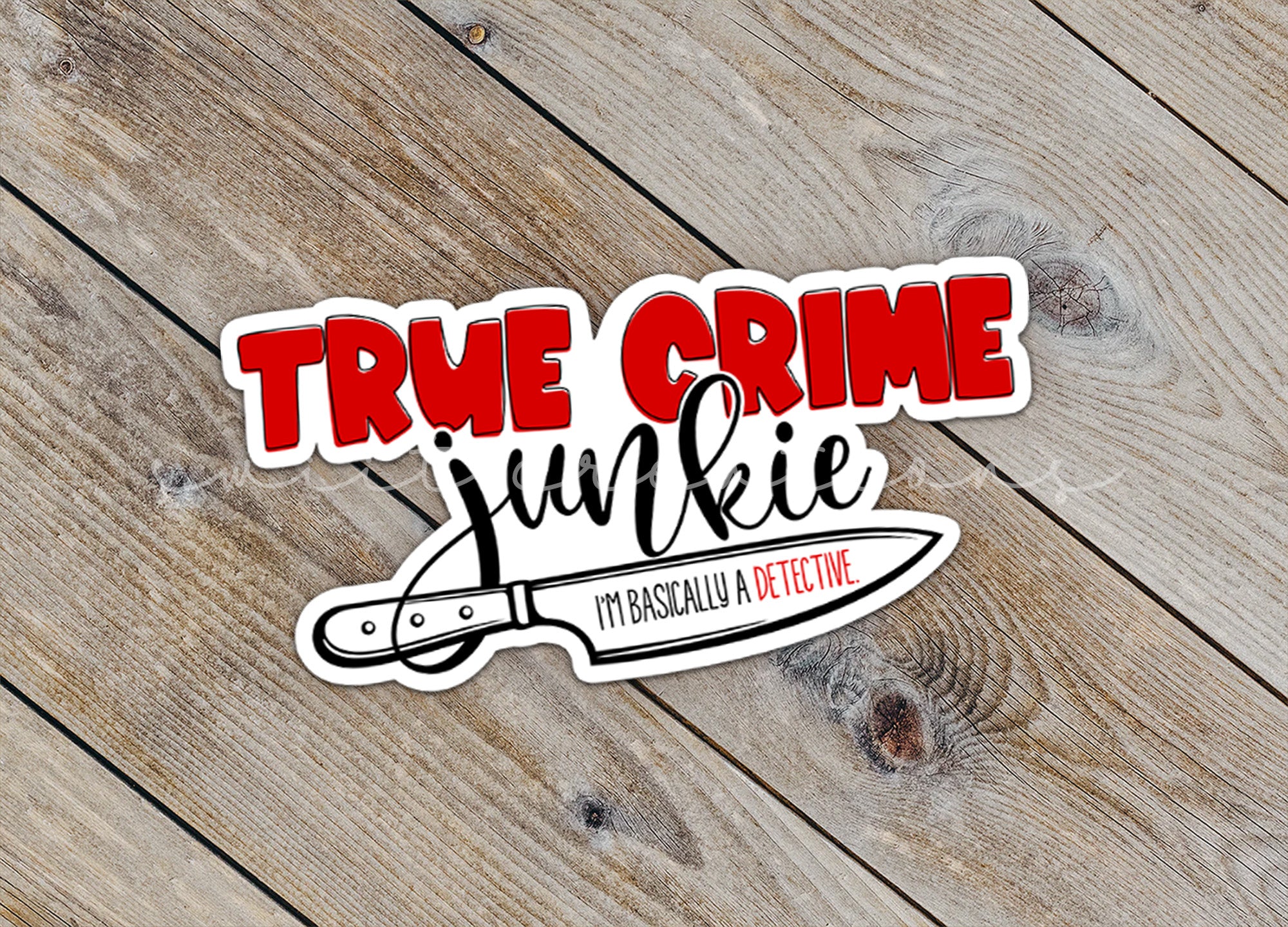 a sticker that says true crime junkie on it