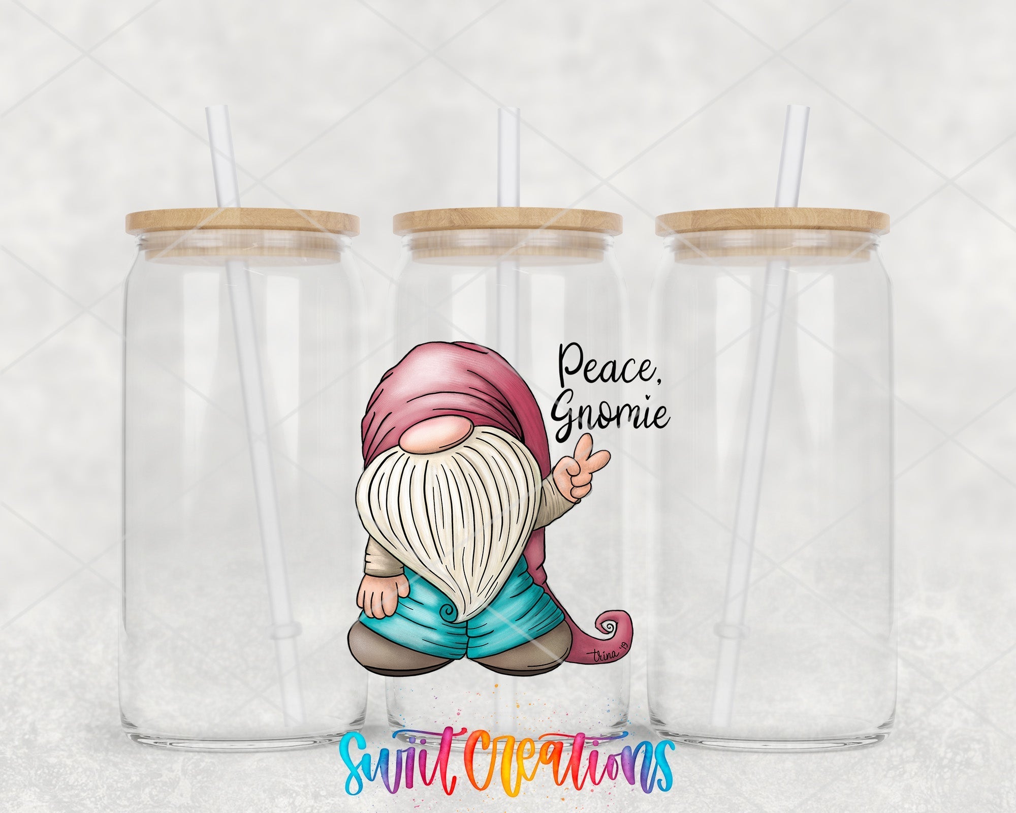 a couple of glass cups with a gnome on them