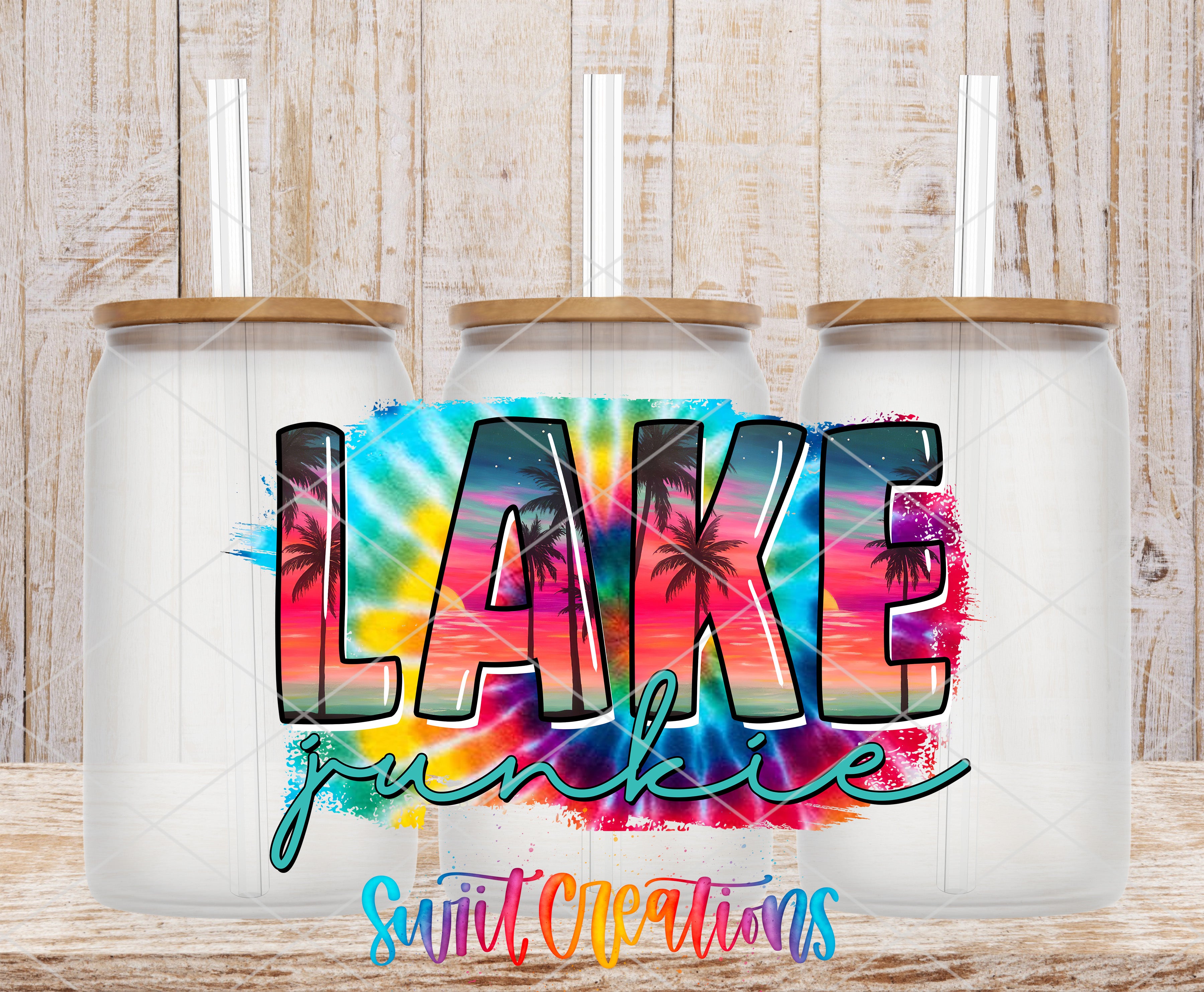 three clear glass jars with lids, each containing a straw, arranged in a row against a wooden background. The word "LAKE" is prominently displayed in the center of the image, with the word "junkie" written below it.