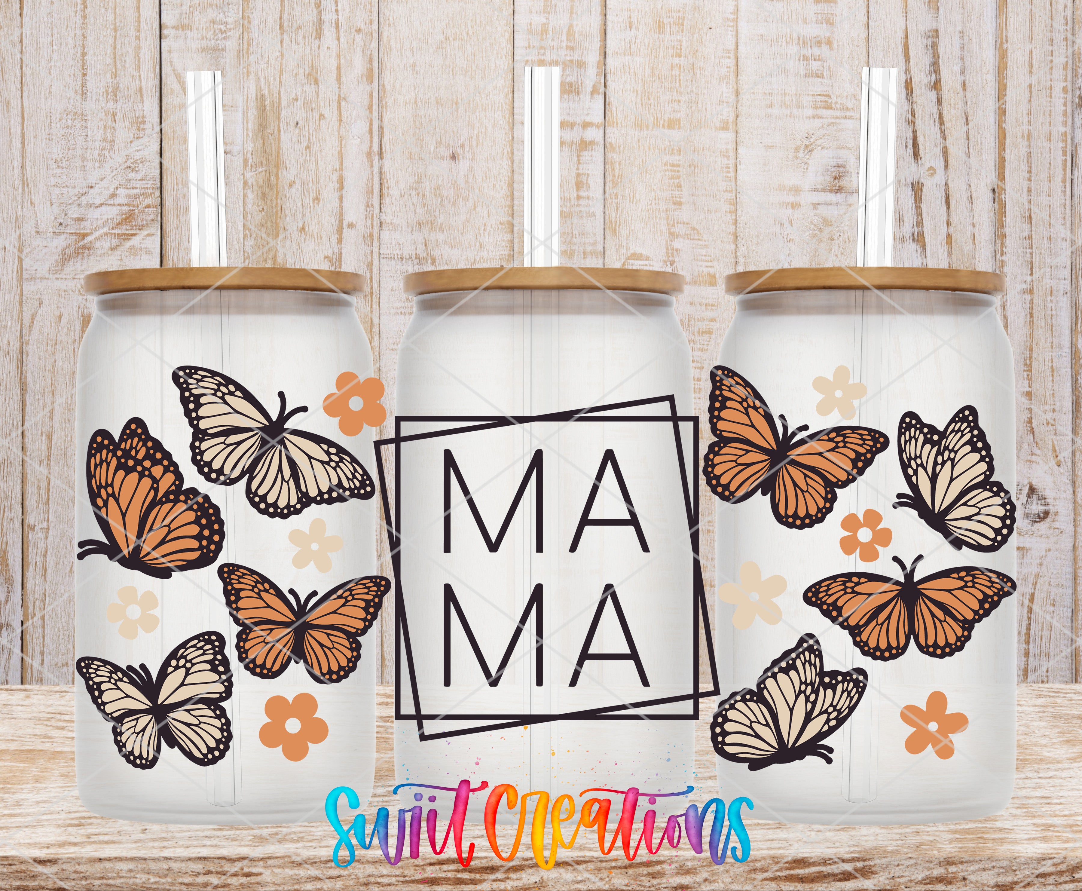 three glass jars with butterfly designs and the word "MAMA" written on them.