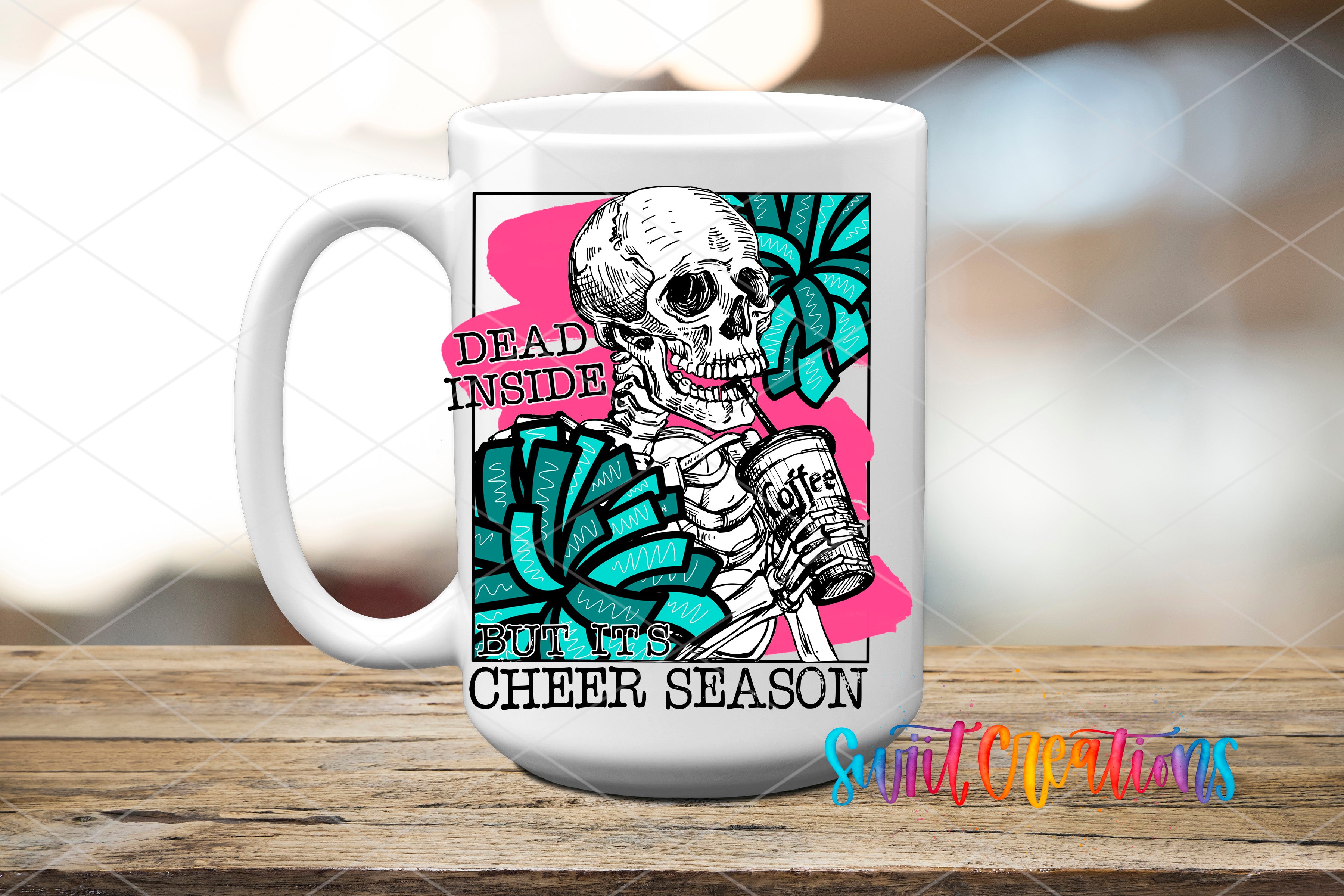 A white ceramic mug with a colorful graphic design featuring a skeleton holding a coffee cup and surrounded by flowers. The text on the mug reads "Dead inside but it's cheer season".