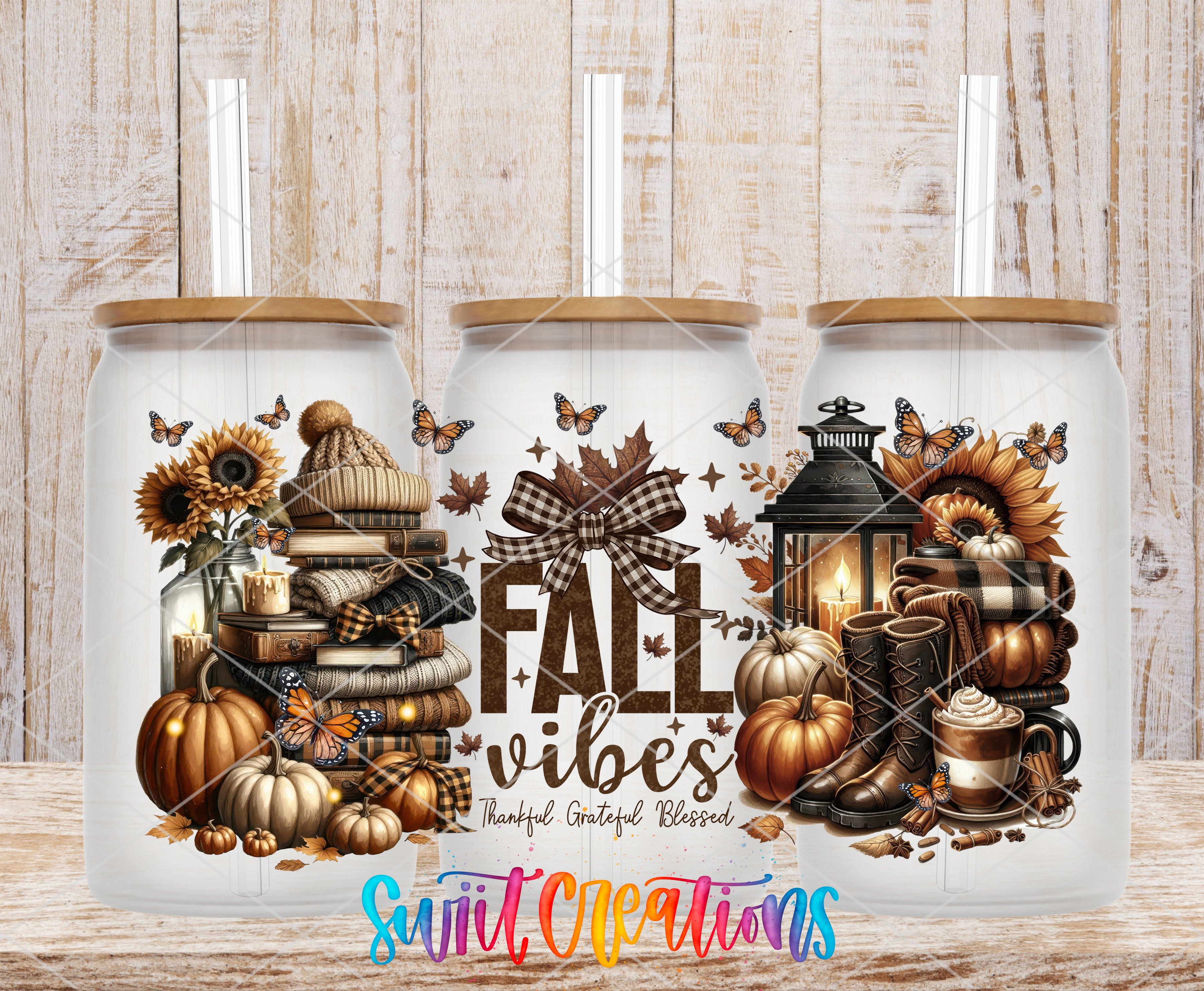three glass jars with fall-themed illustrations on them, including pumpkins, lanterns, and other seasonal elements.