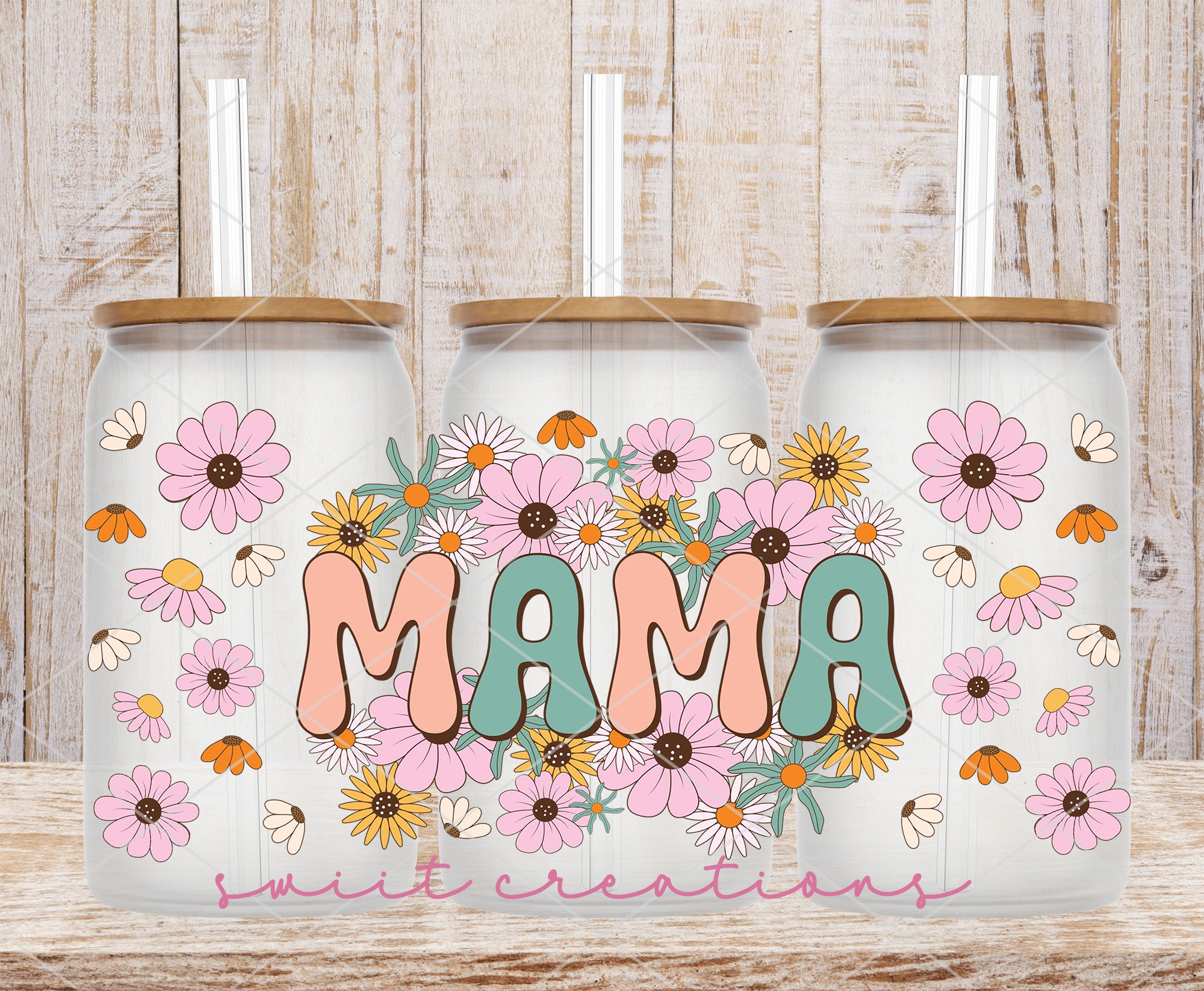 two personalized tumbles with flowers on them