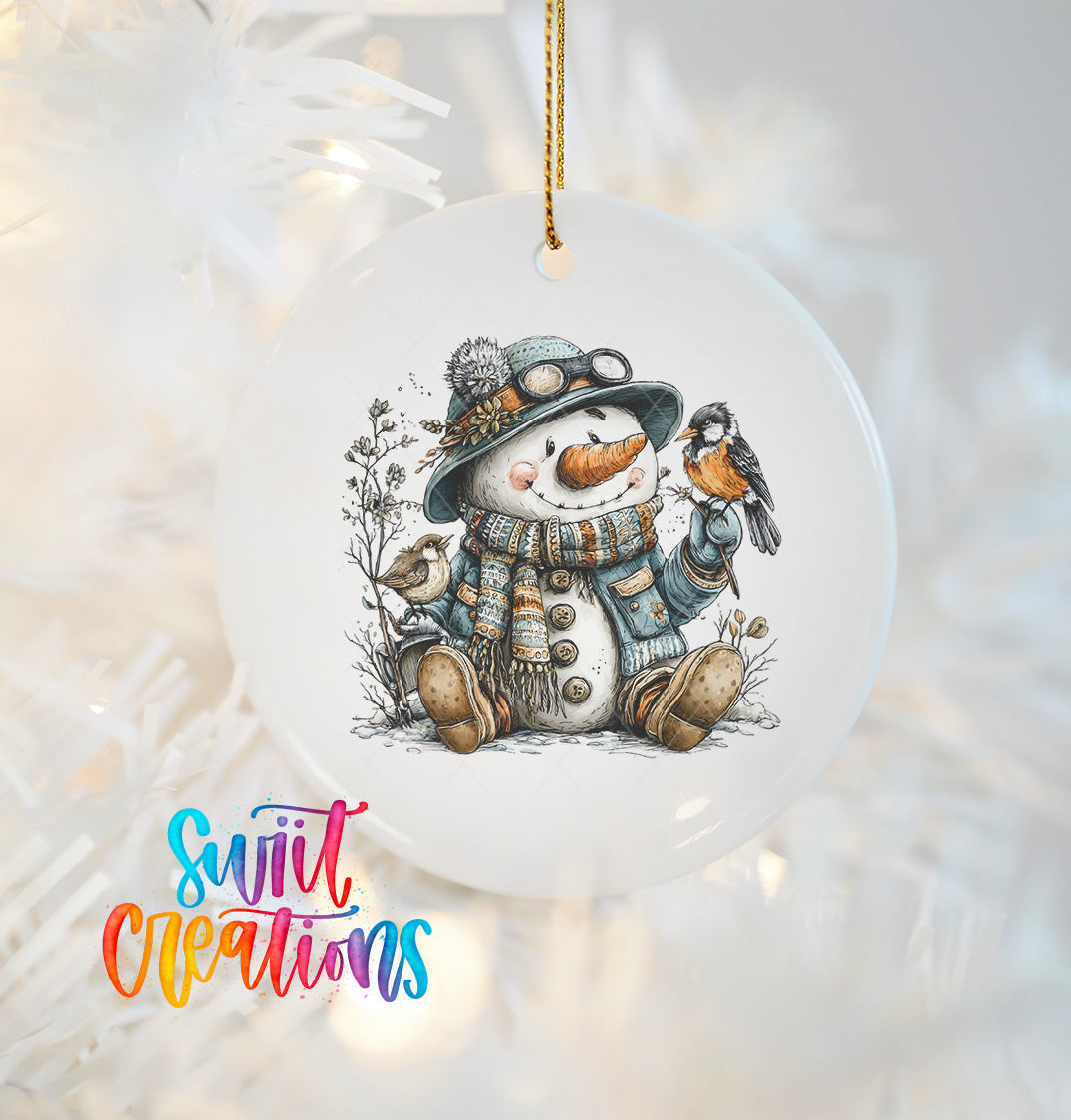 A snowman ornament with a bird perched on its shoulder, wearing a hat and scarf, is hanging on a Christmas tree.