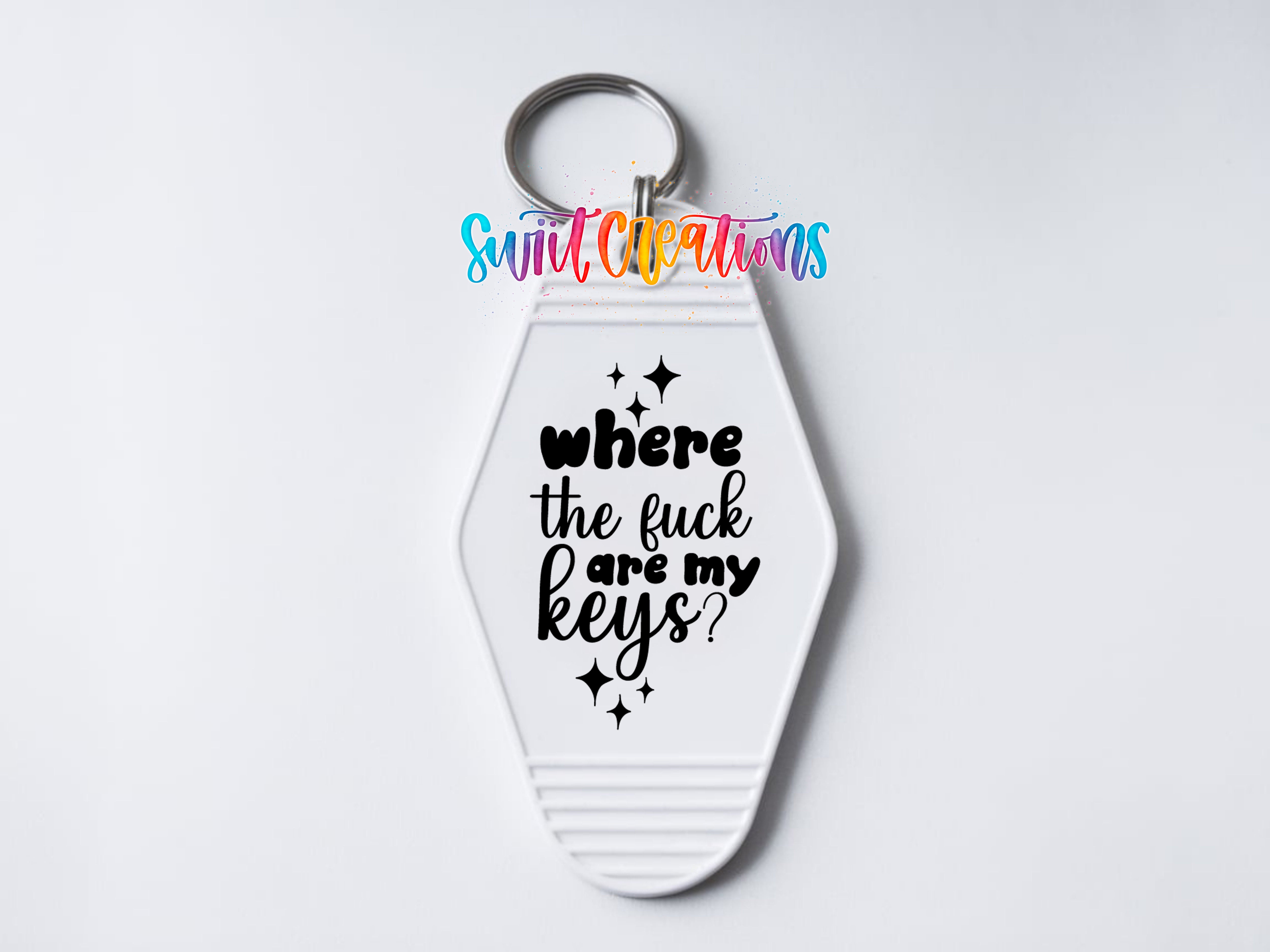 A keychain with a keyring and a printed message on it.