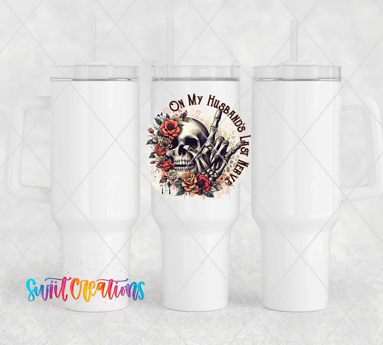 a white tumbler cup with a skull and roses on it