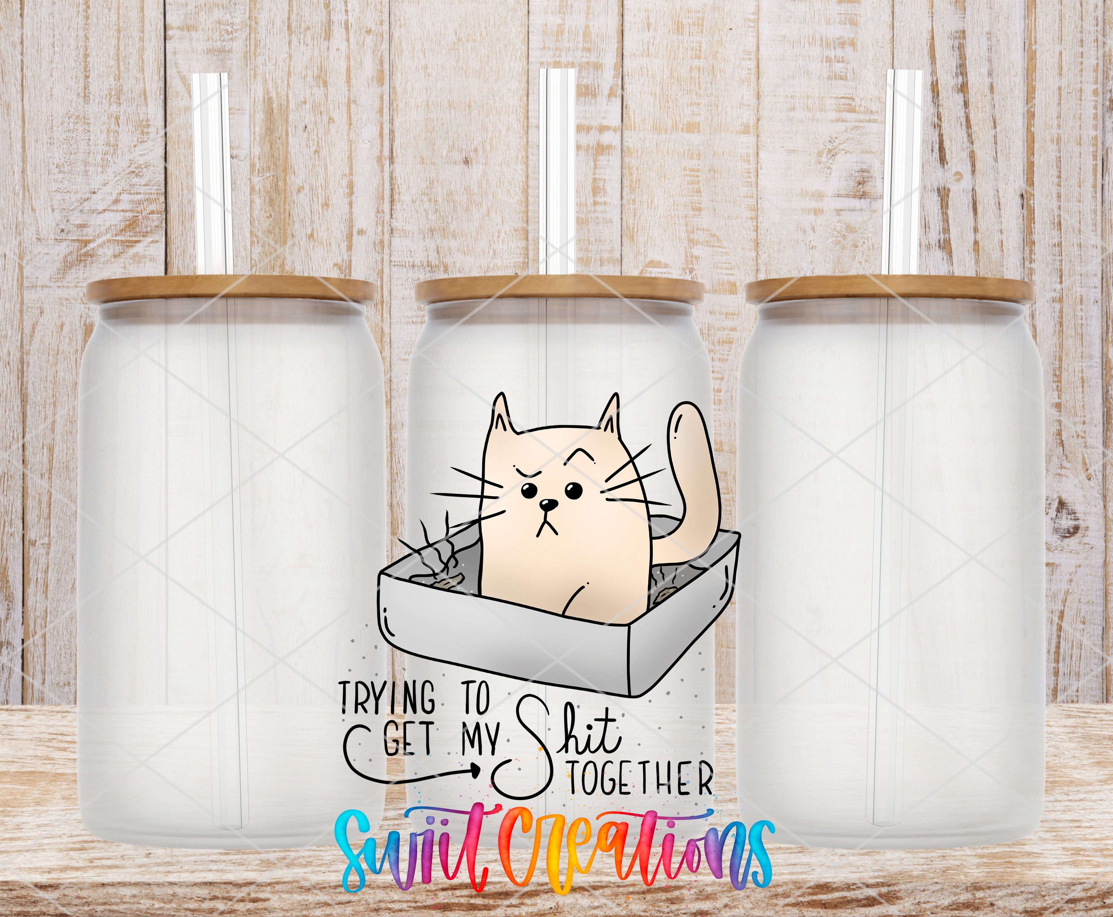 a cartoon cat sitting inside a glass jar with a lid, accompanied by the text "Trying to get my shit together" and "Swift Creations" written below.