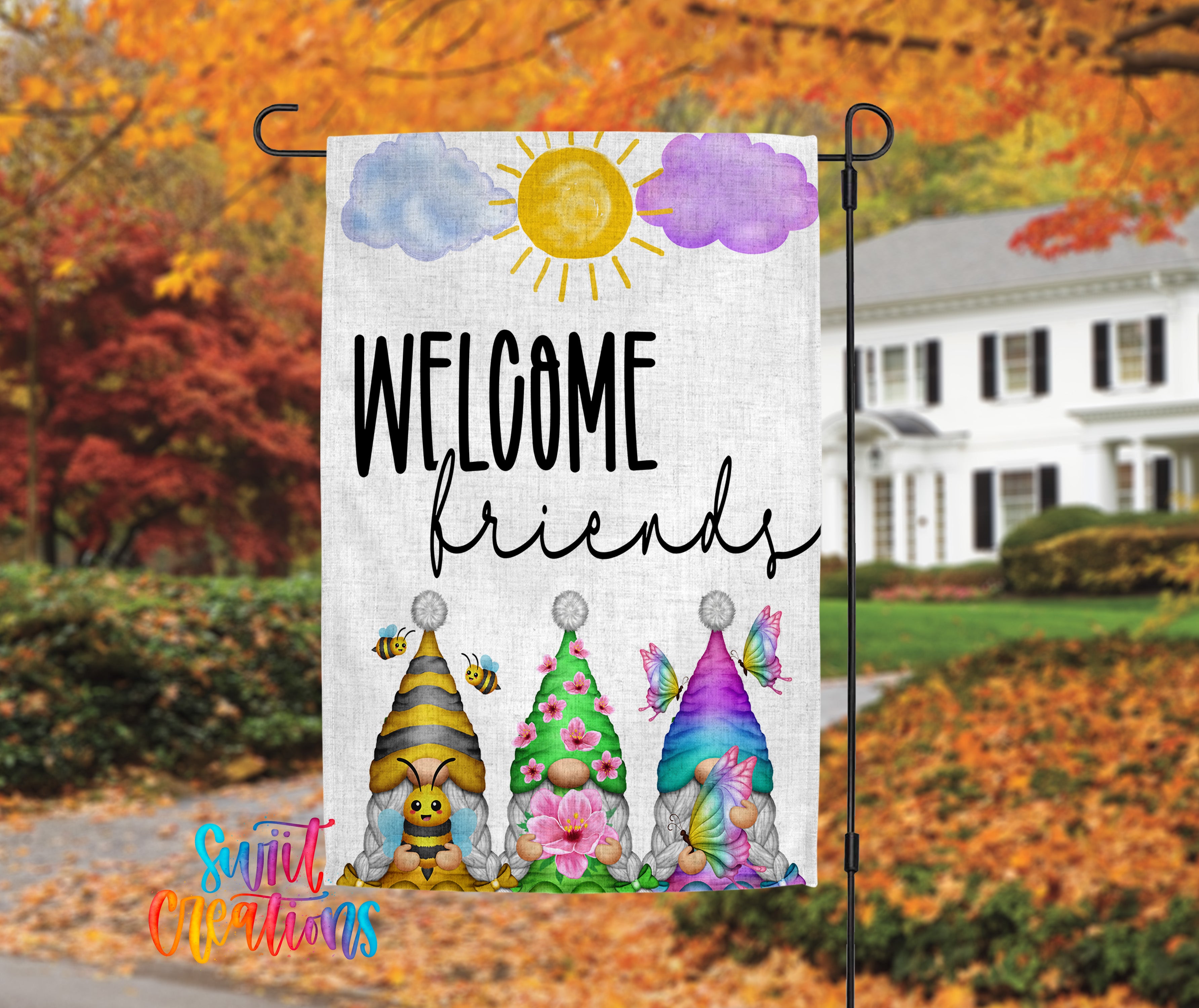 A colorful welcome sign featuring three gnomes and a sun, with the text "WELCOME friends" displayed prominently.